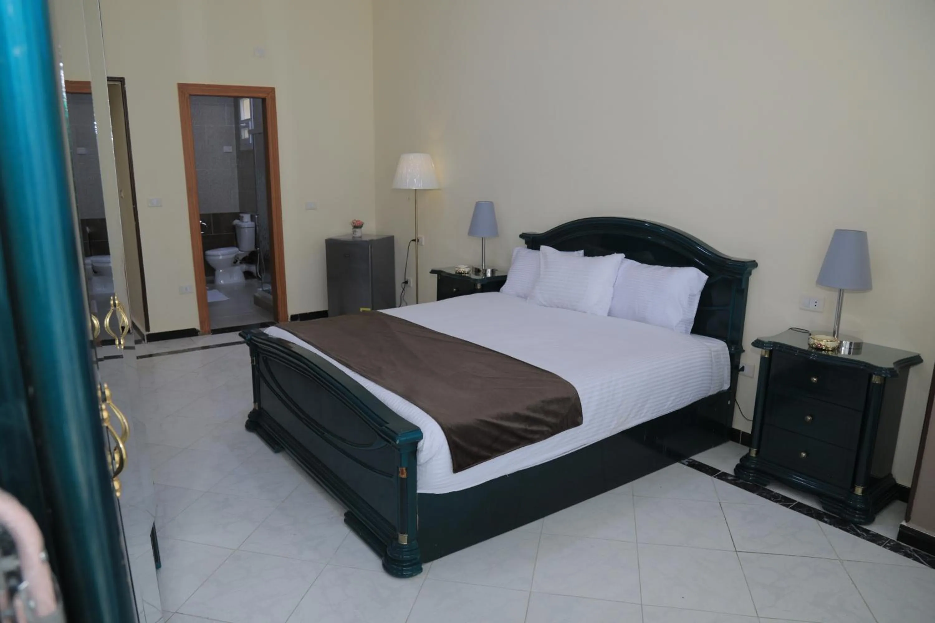 Bed in Jewel Fayed Hotel