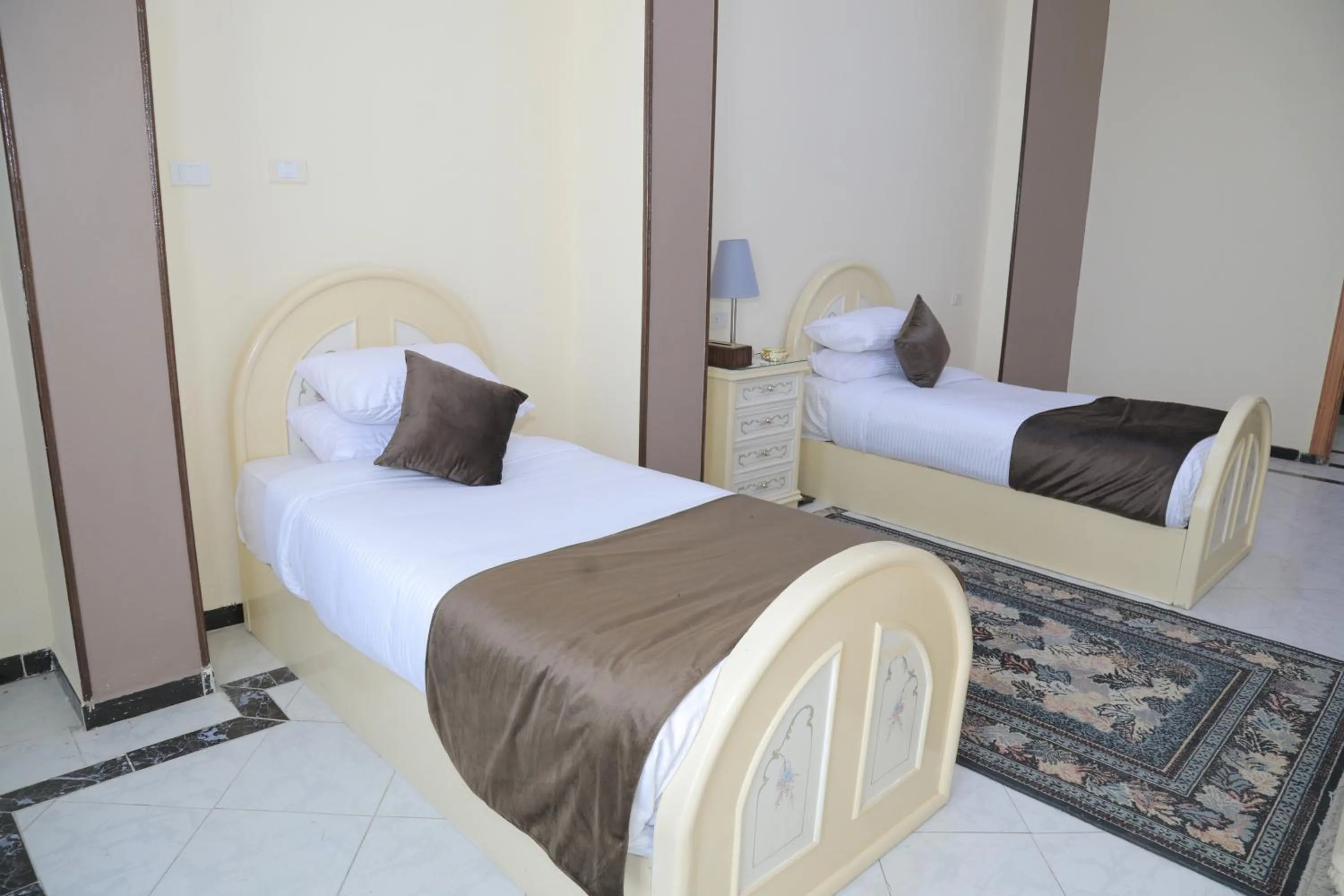 Bed in Jewel Fayed Hotel