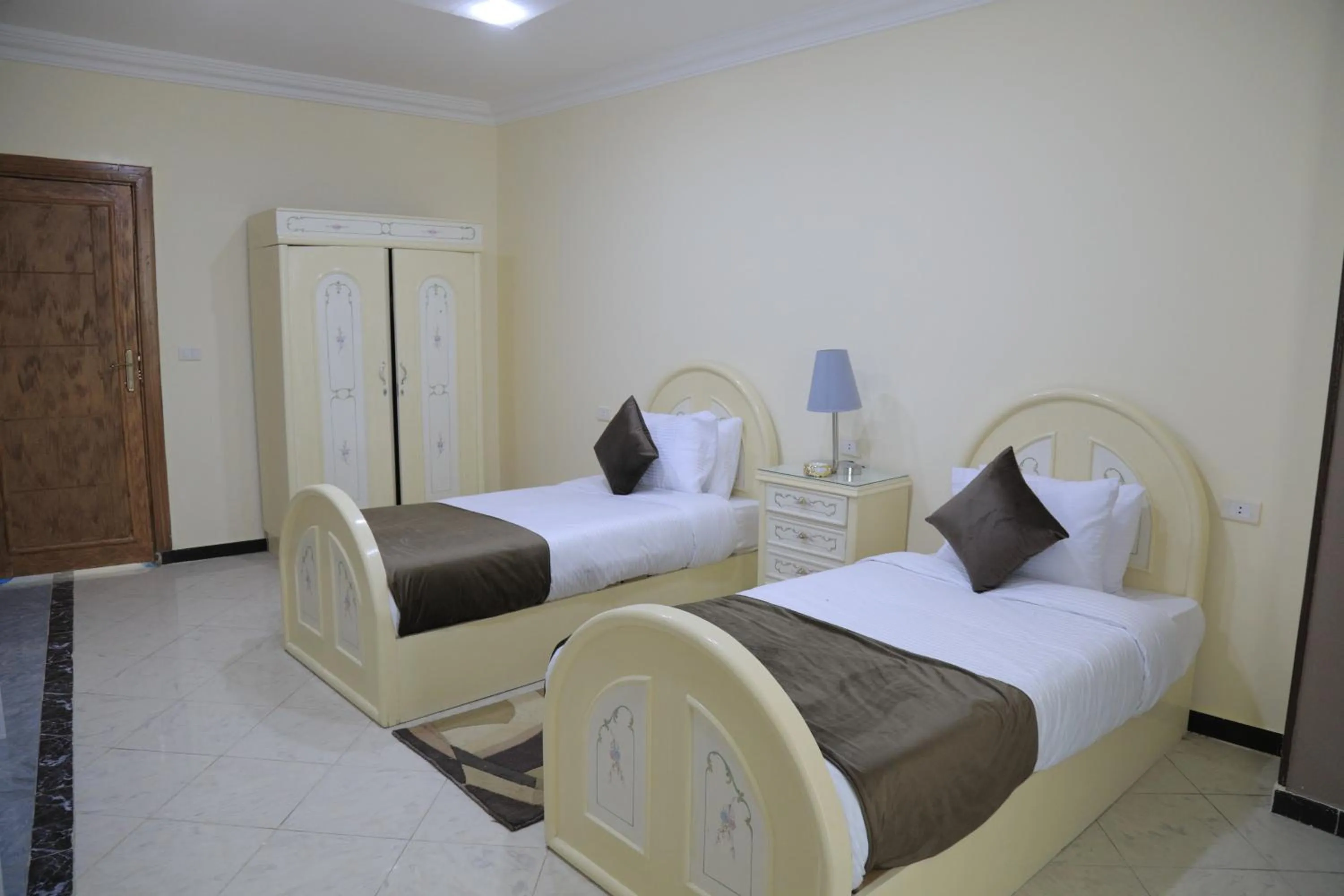 Bed in Jewel Fayed Hotel