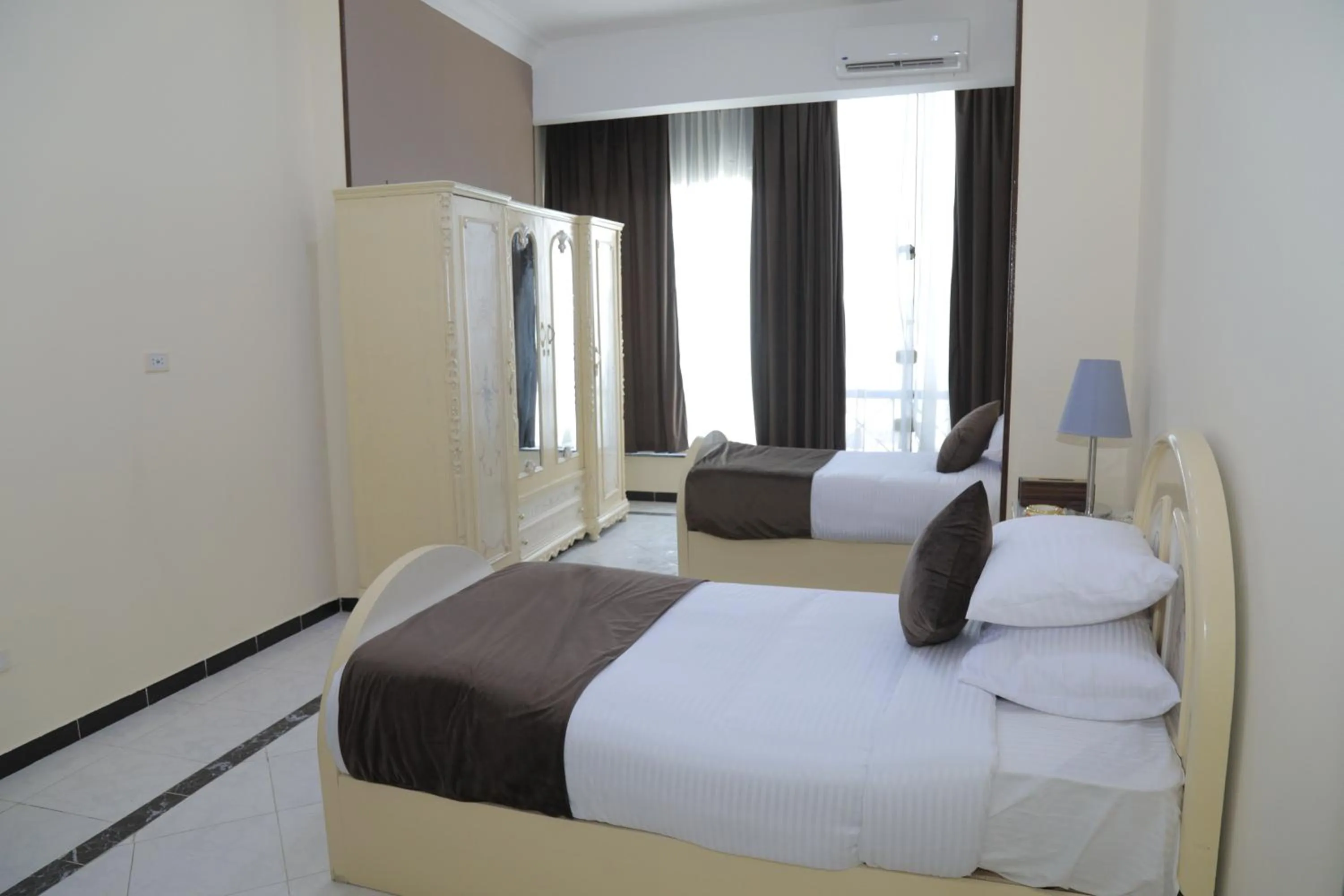 Bed in Jewel Fayed Hotel