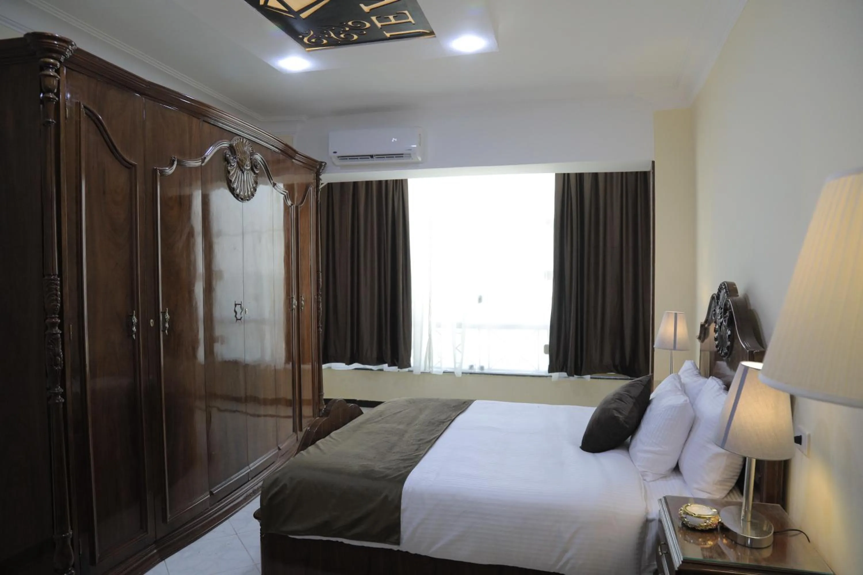 Bed in Jewel Fayed Hotel