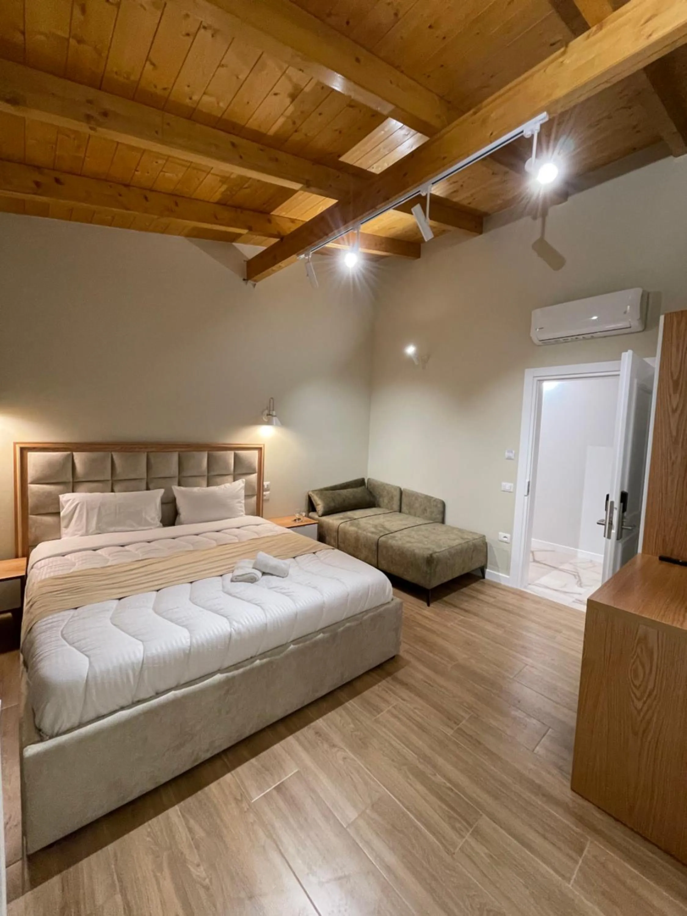 Bed in Arial Penthouse Suites