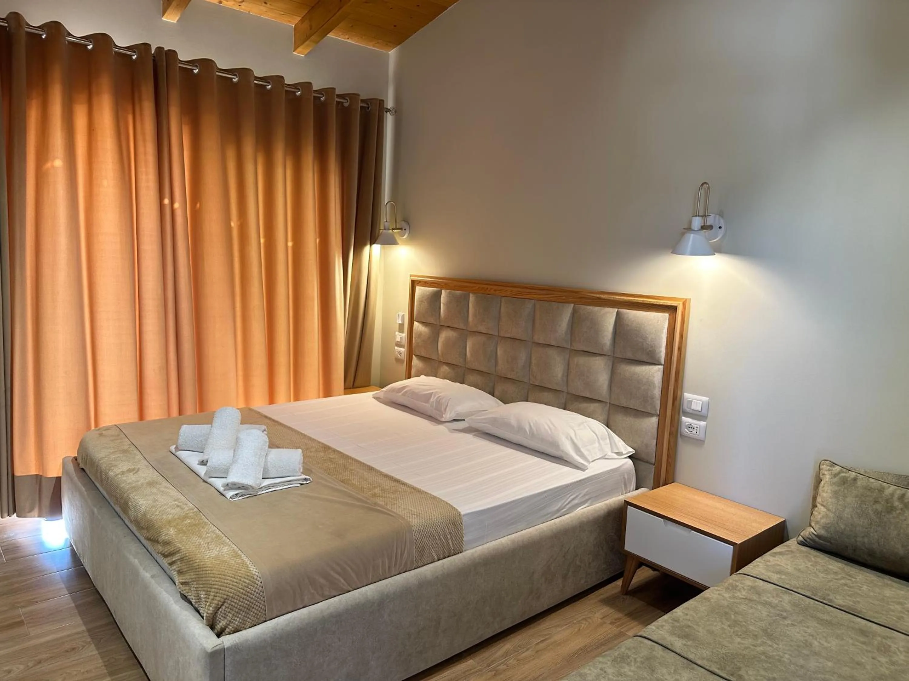 Bed in Arial Penthouse Suites