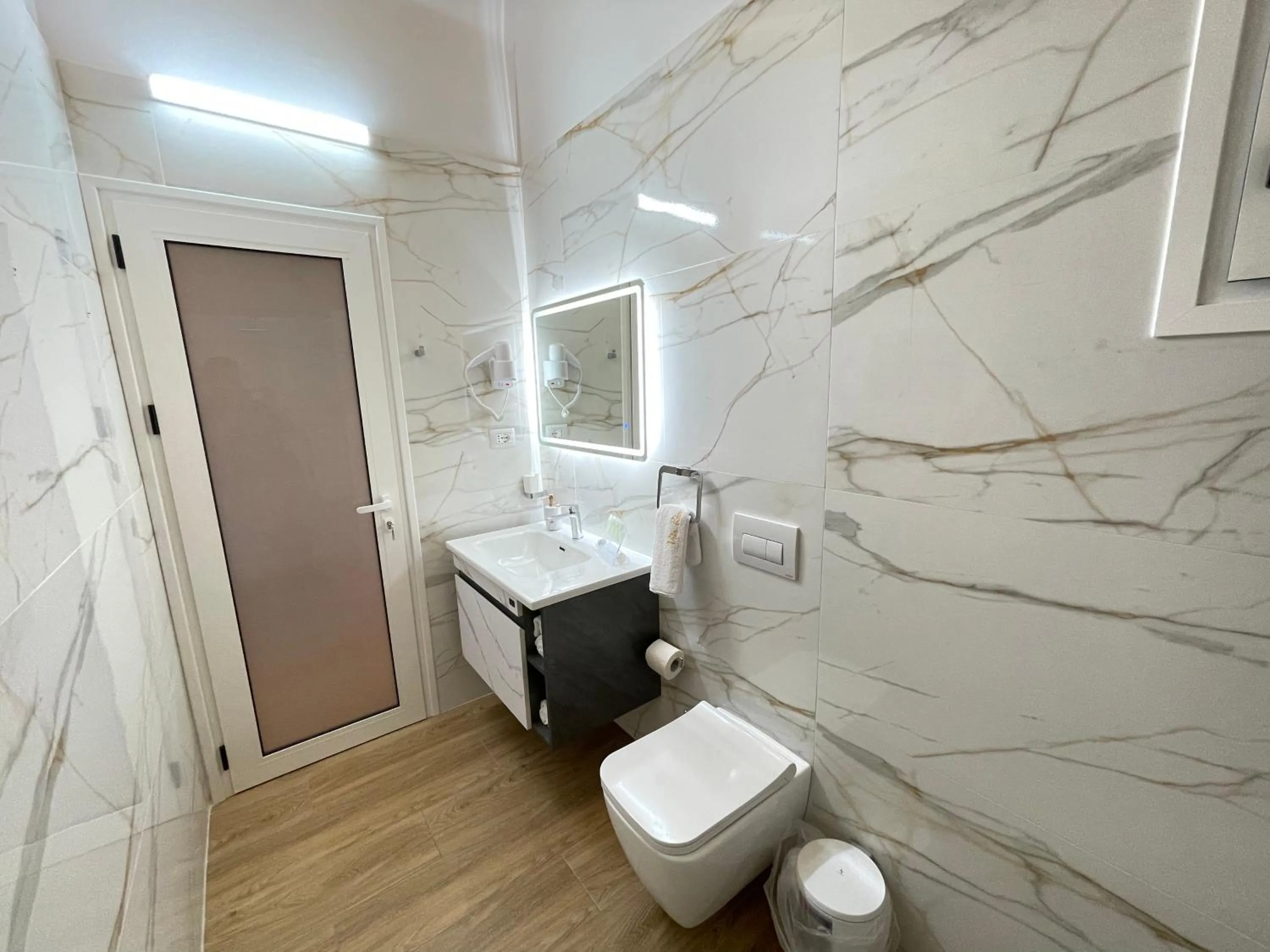 Toilet in Arial Penthouse Suites