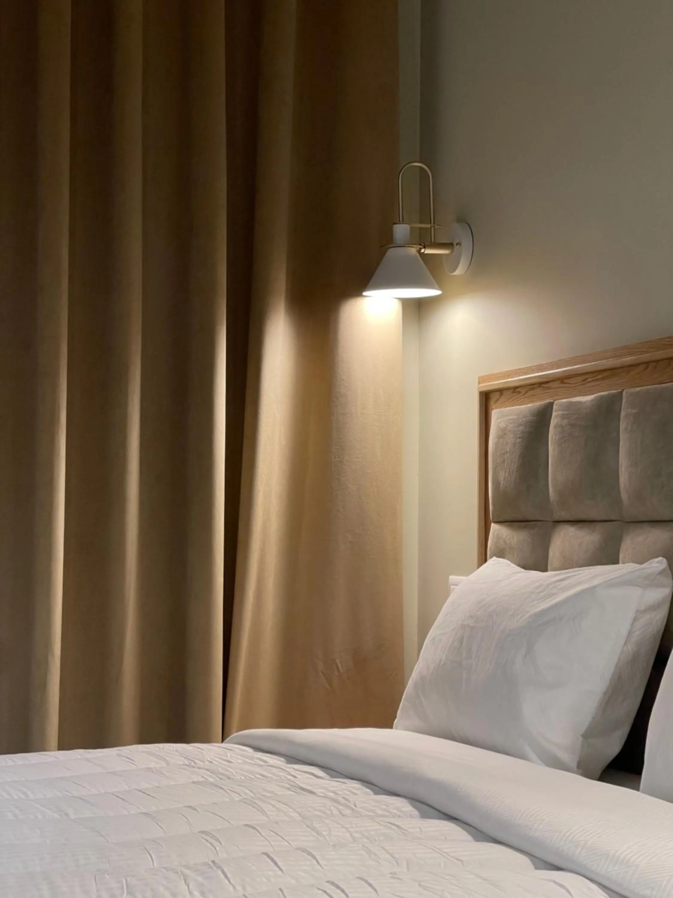 Bed in Arial Penthouse Suites