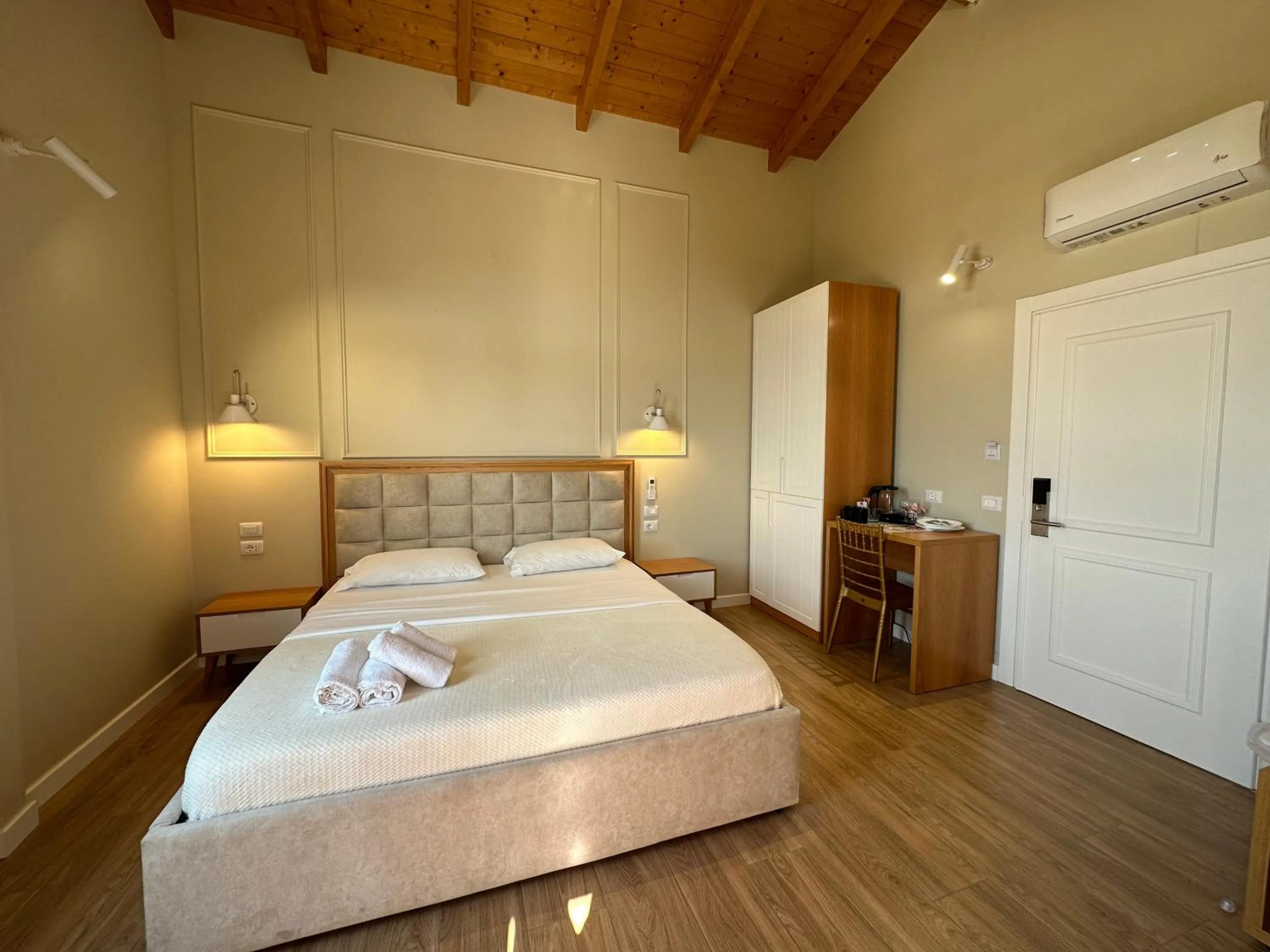 Bed in Arial Penthouse Suites