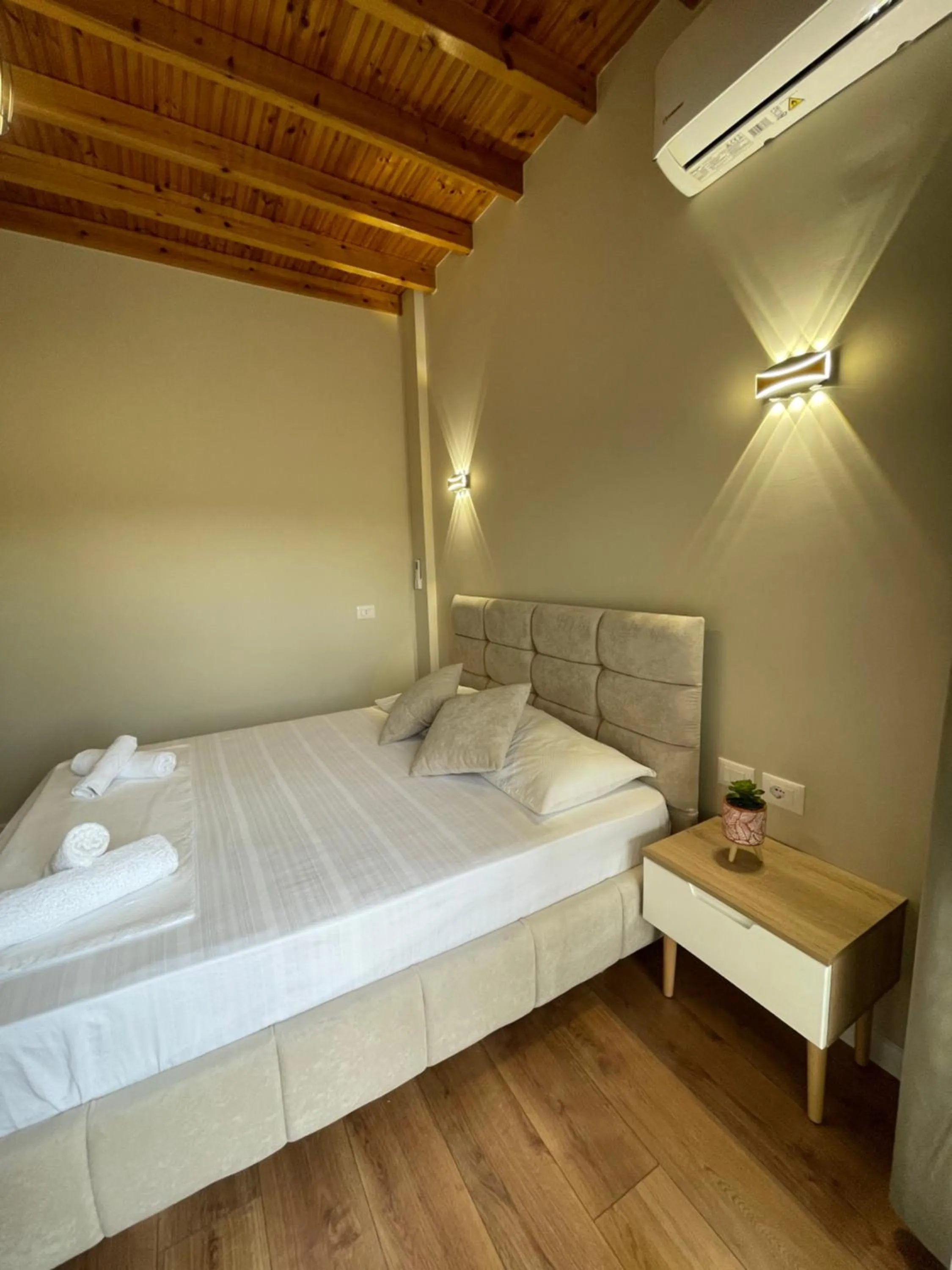 Bed in Arial Penthouse Suites