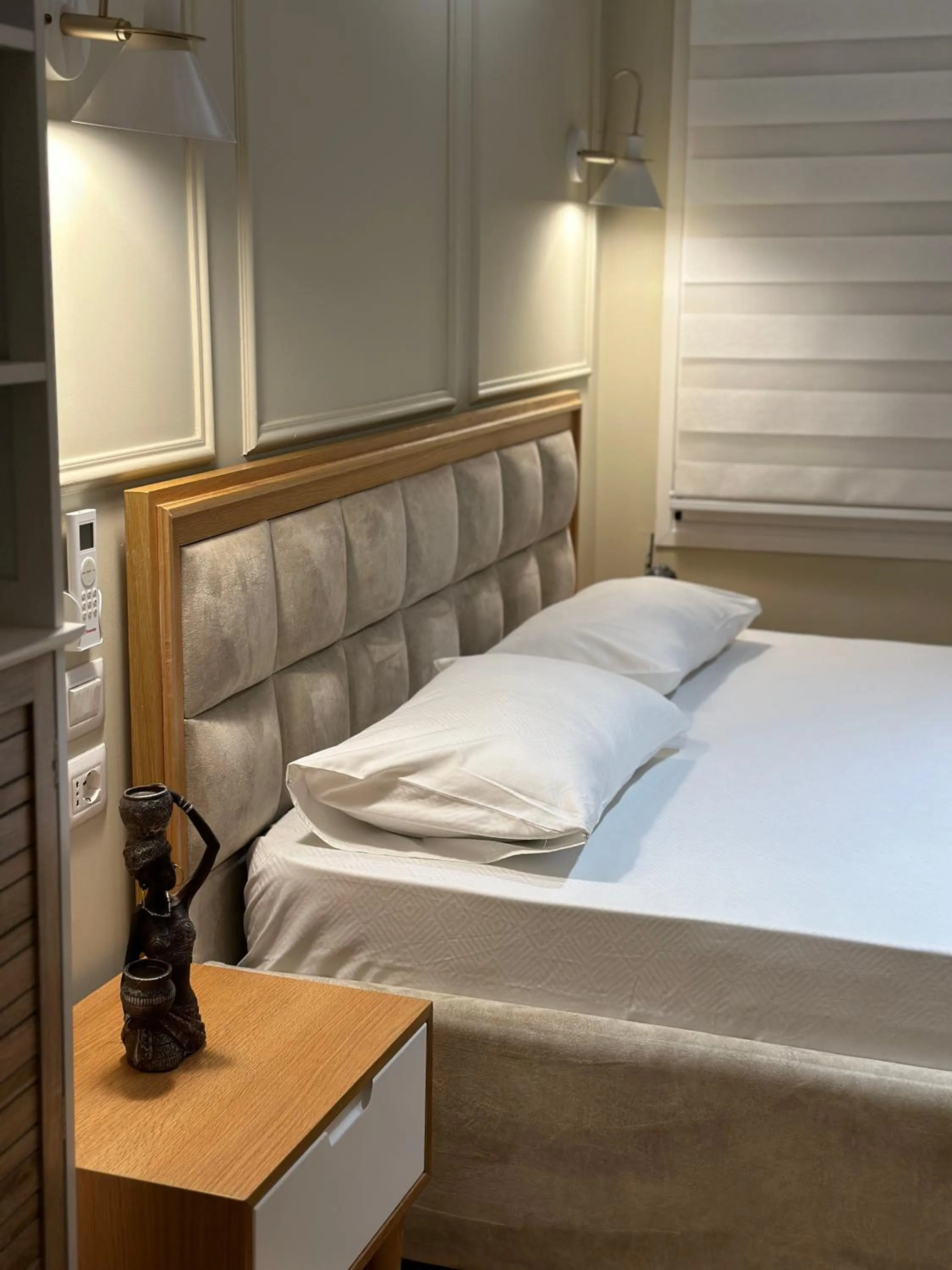 Bed in Arial Penthouse Suites