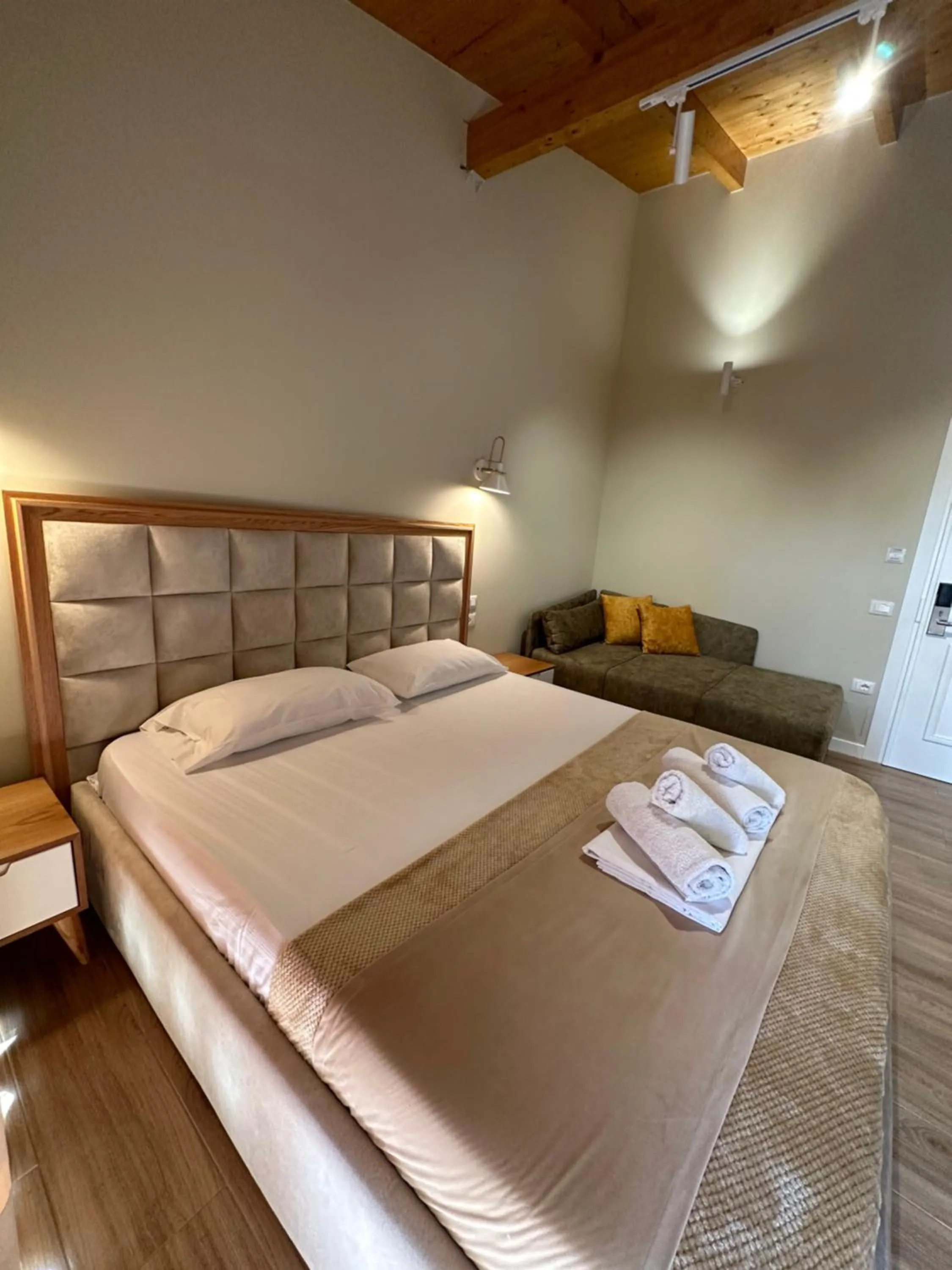 Bed in Arial Penthouse Suites