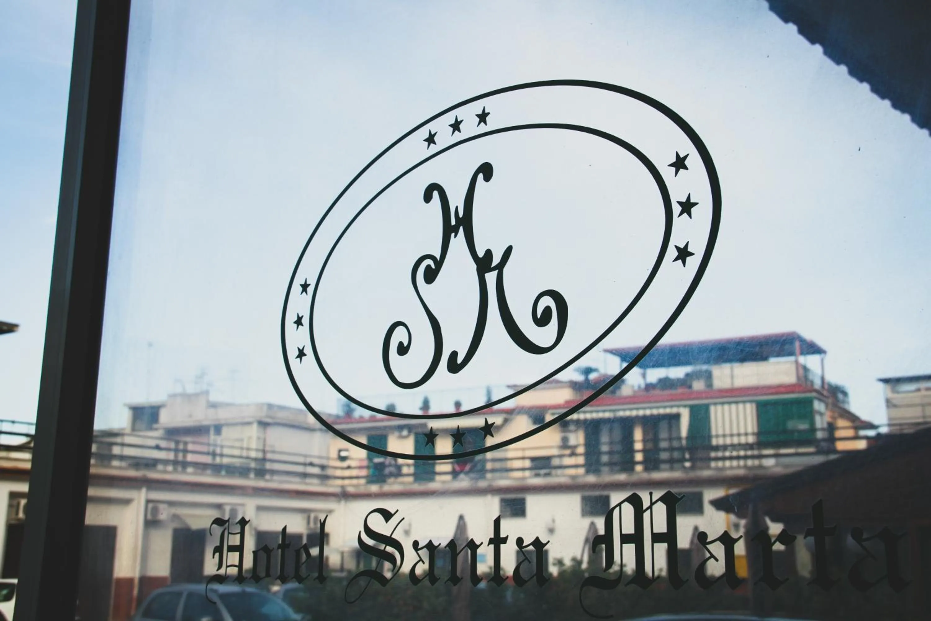 Property logo or sign in Hotel Santa Marta