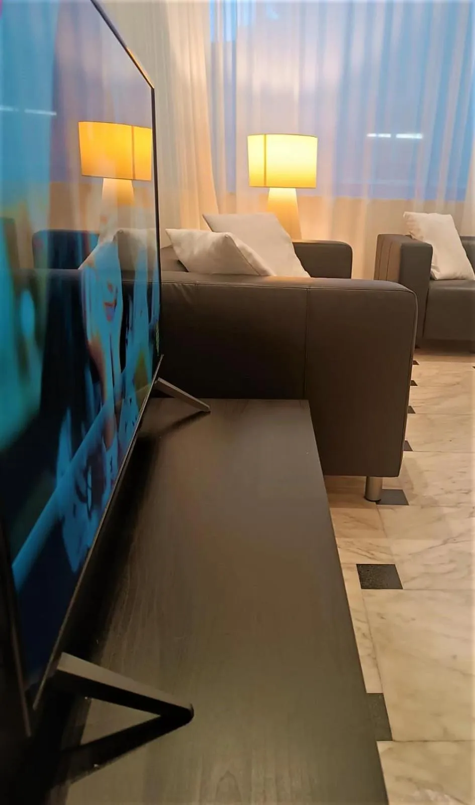Communal lounge/ TV room in Hotel Exclusive