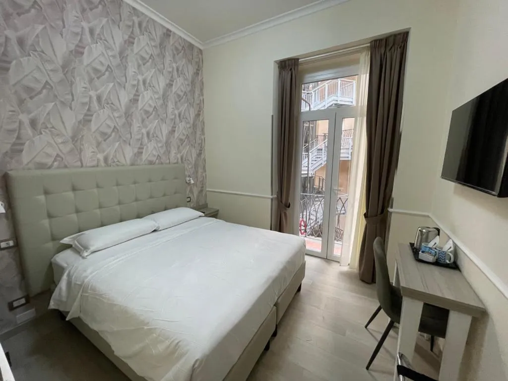 Bed in Hotel Le Petit