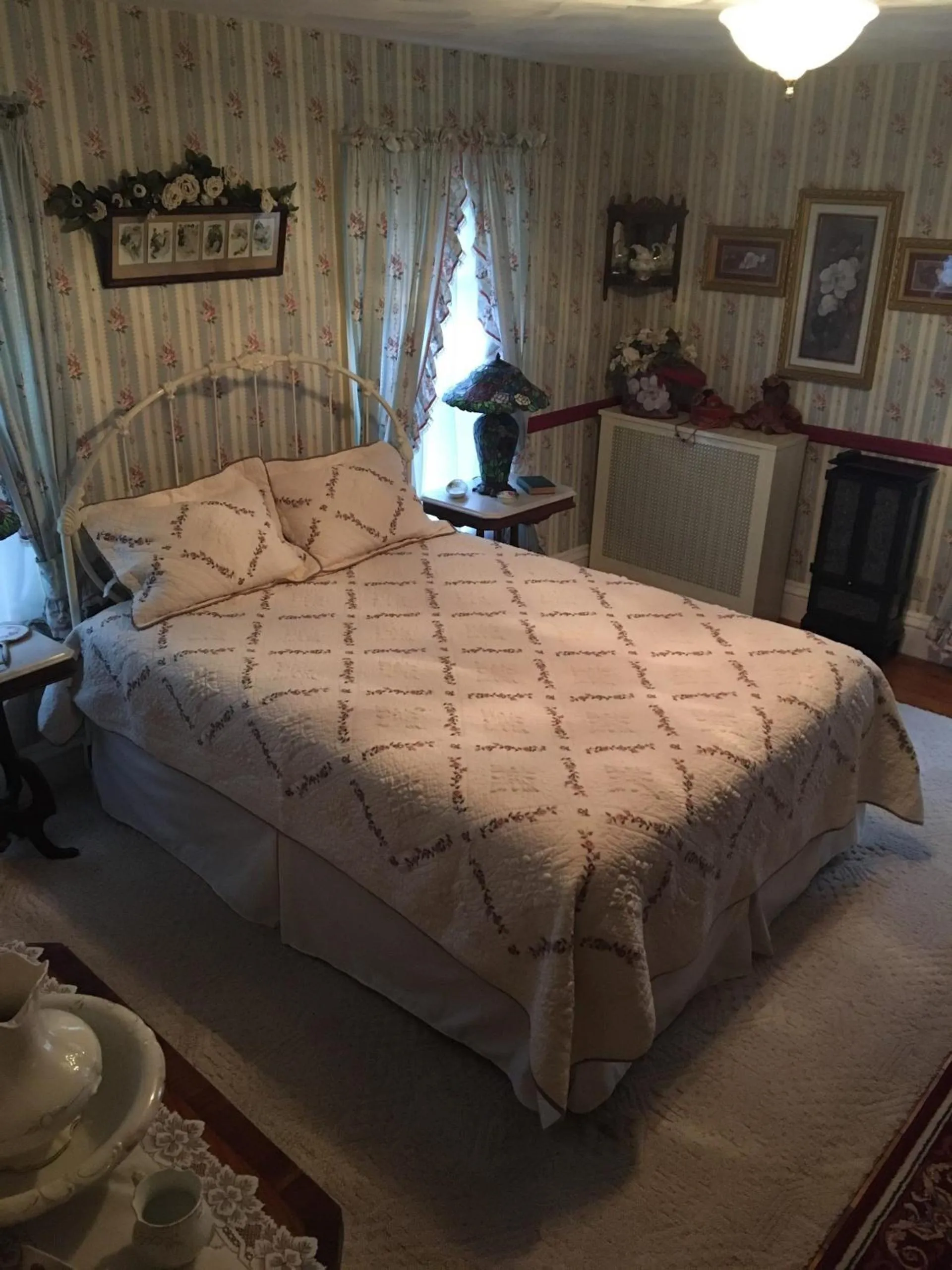 Bed in Raindrops On Roses Bed & Breakfast