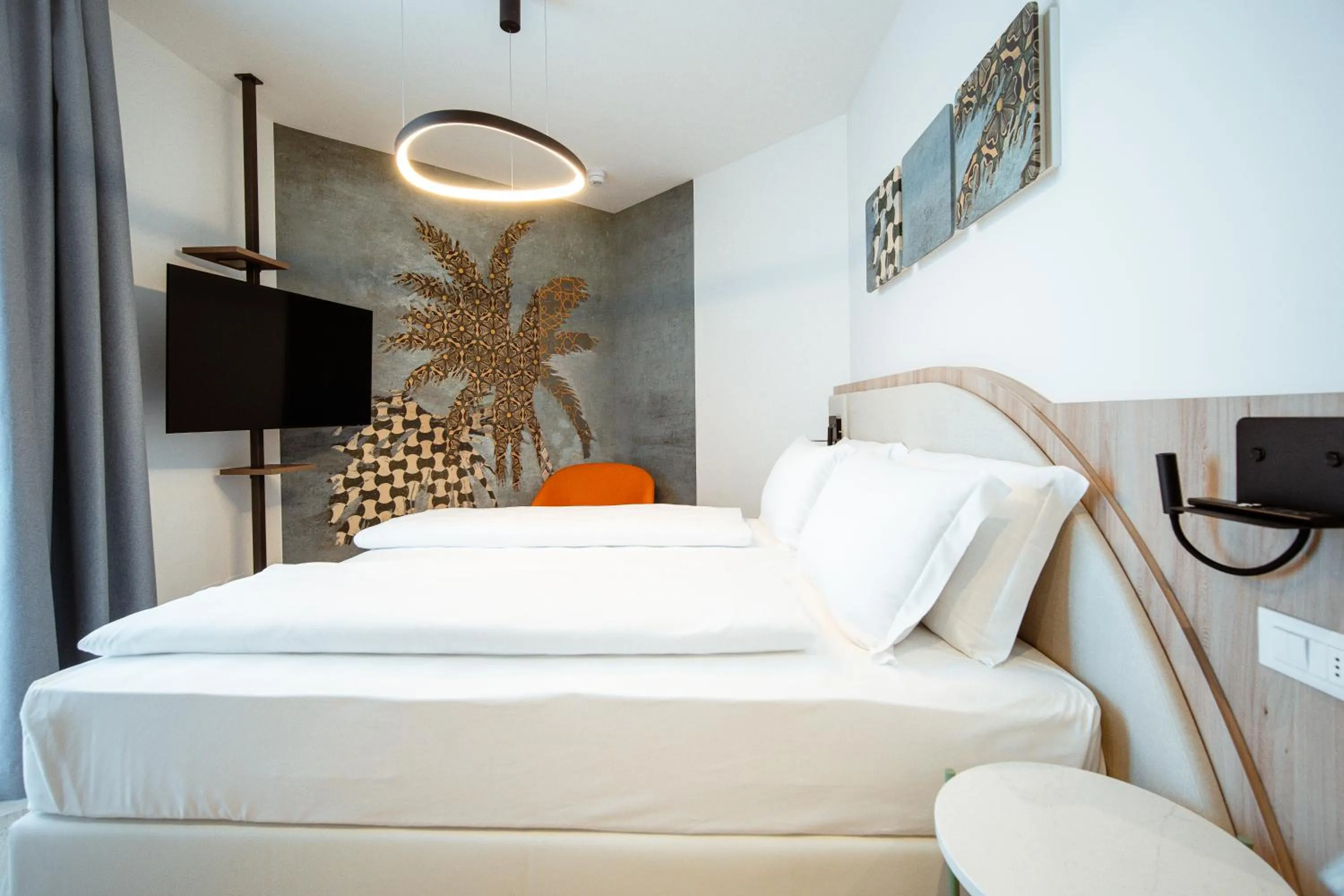 Bed in Hotel Cavalieri Palace & Suites