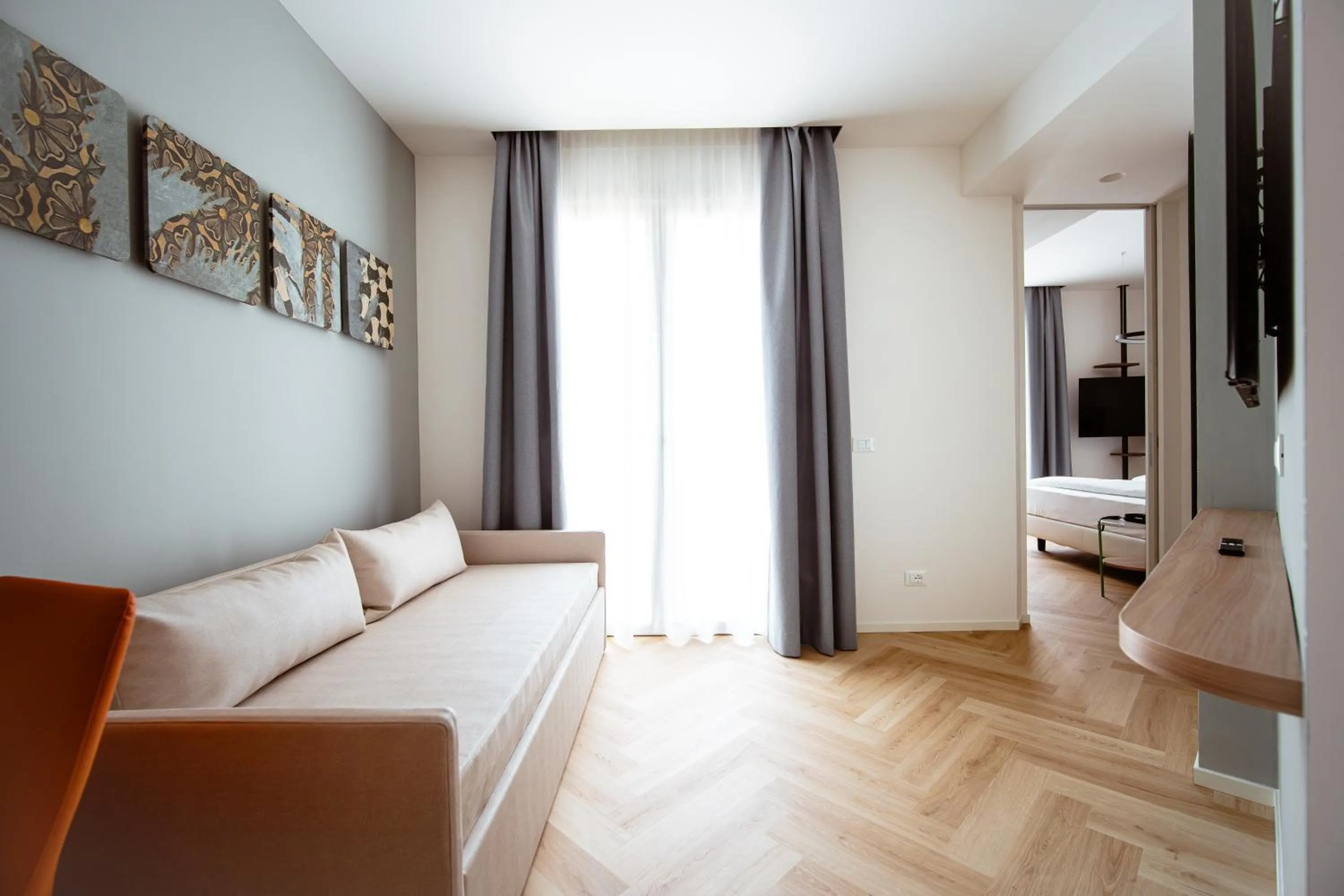 Seating area, Bed in Hotel Cavalieri Palace & Suites