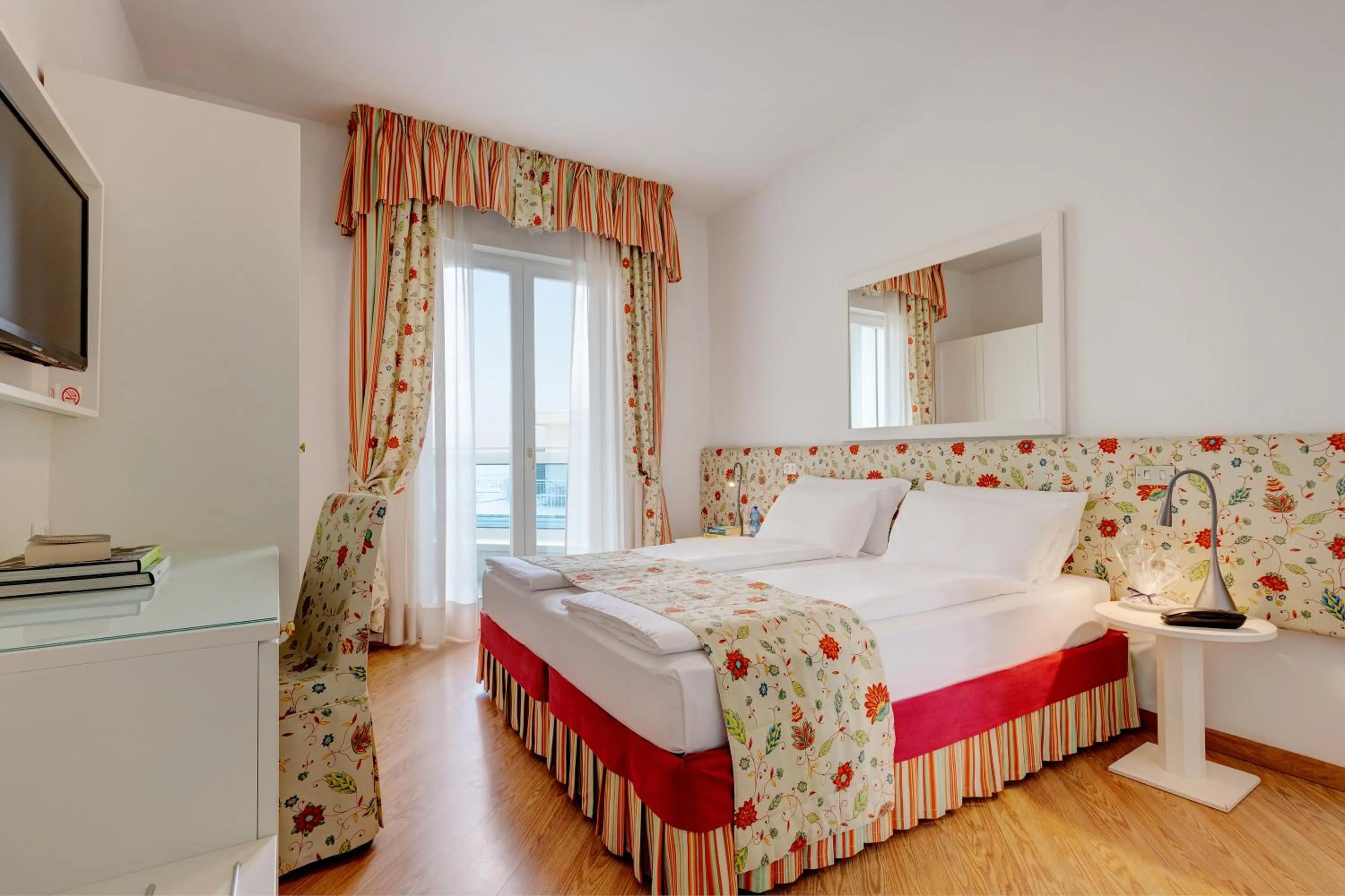 Bed in Hotel Cavalieri Palace & Suites