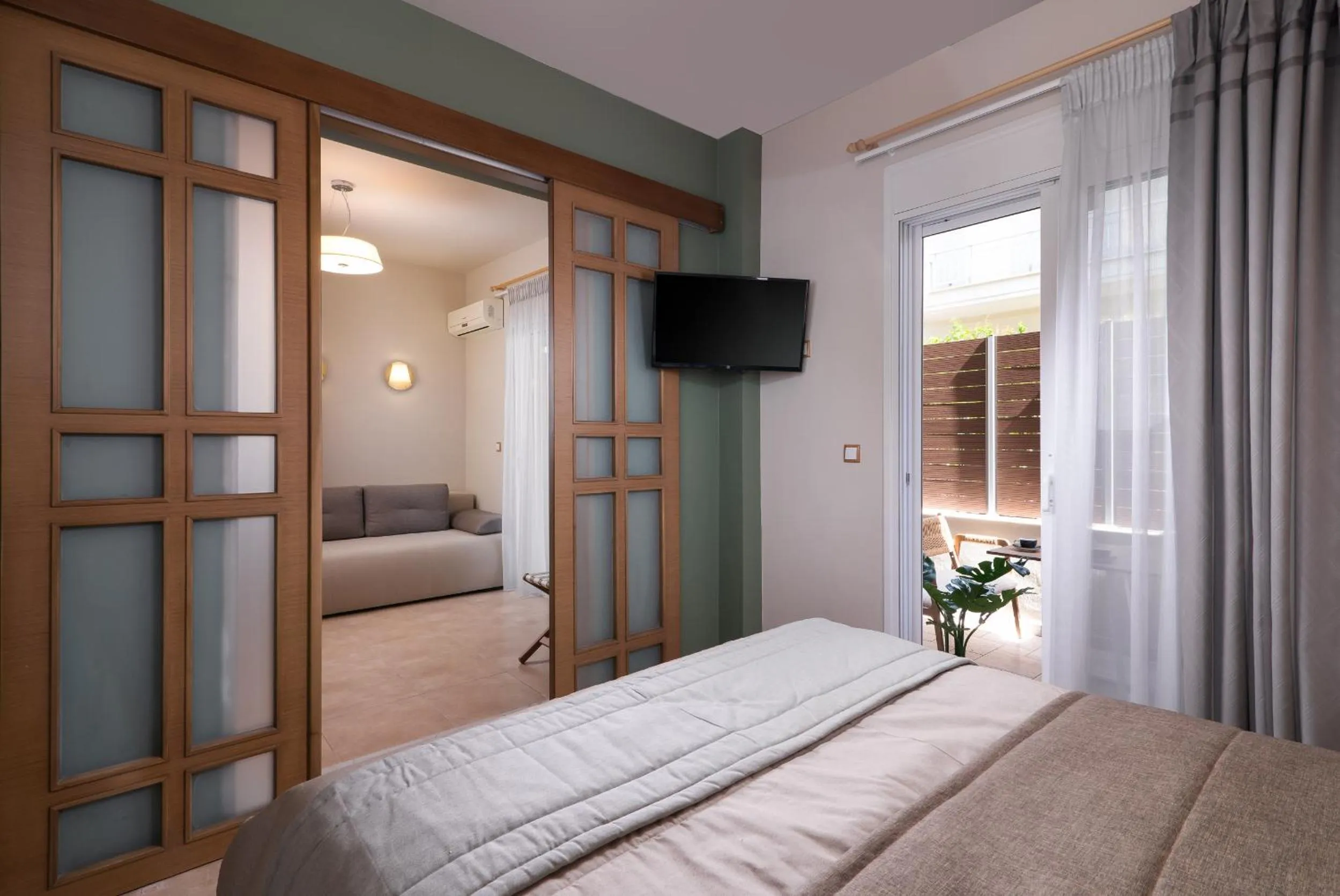 Bed in ELLE Rooms & Suites