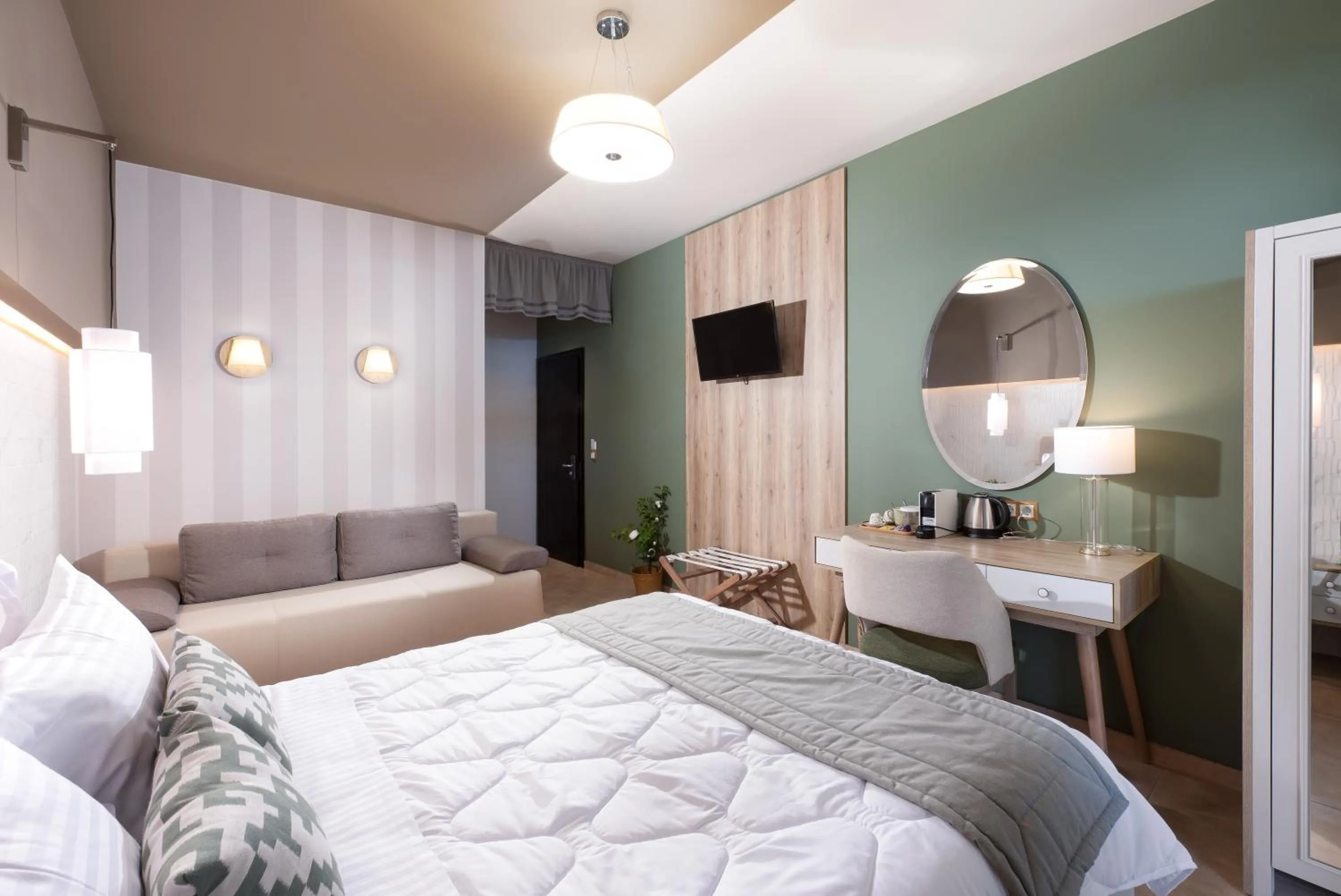 Bed in ELLE Rooms & Suites