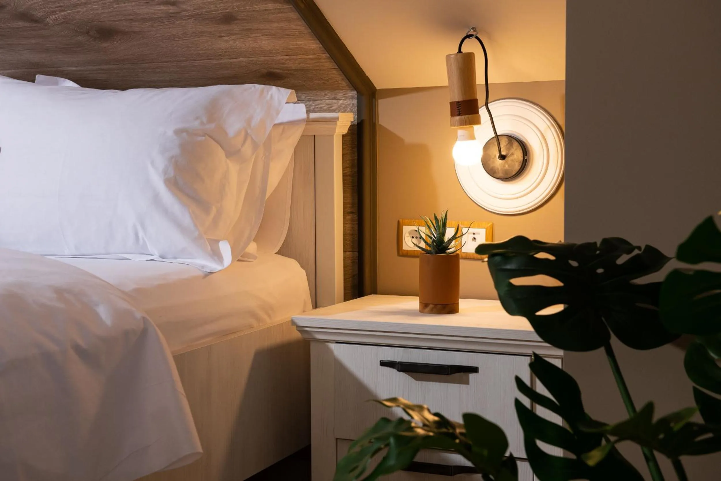 Bed in ELLE Rooms & Suites