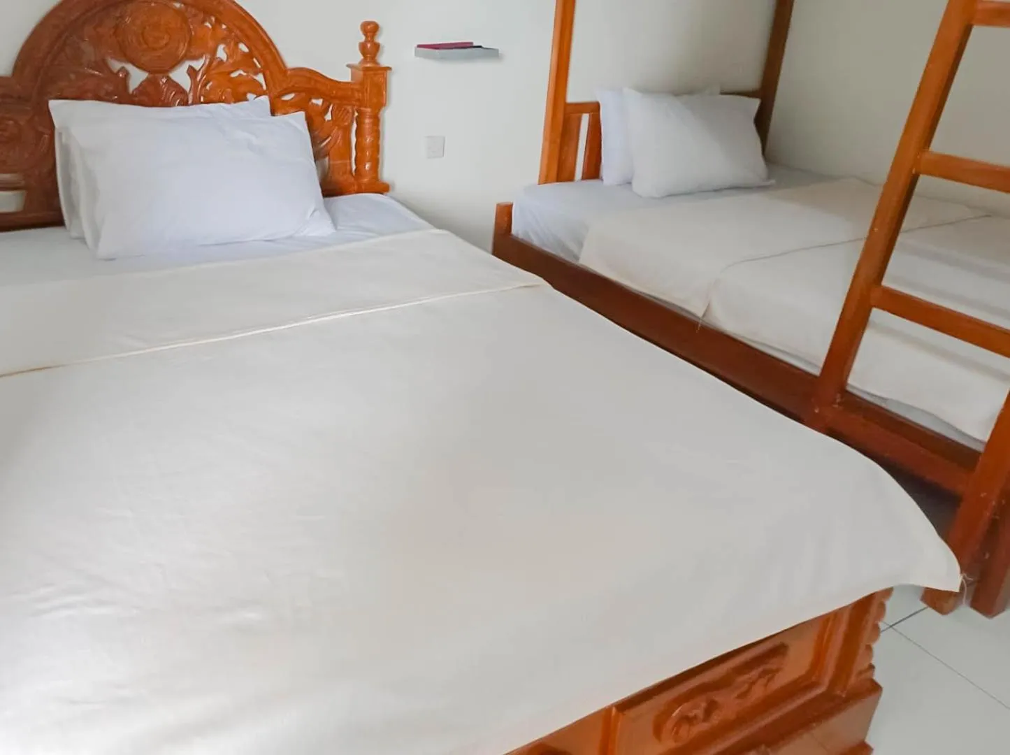 Bed in Penginapan Al Firdausi Syariah Mitra RedDoorz