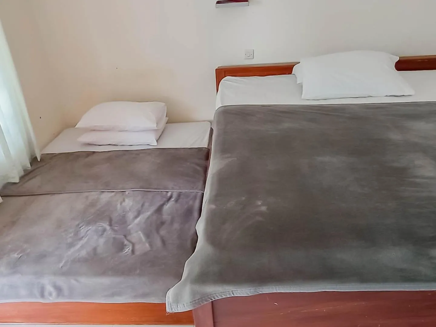 Bed in Penginapan Al Firdausi Syariah Mitra RedDoorz