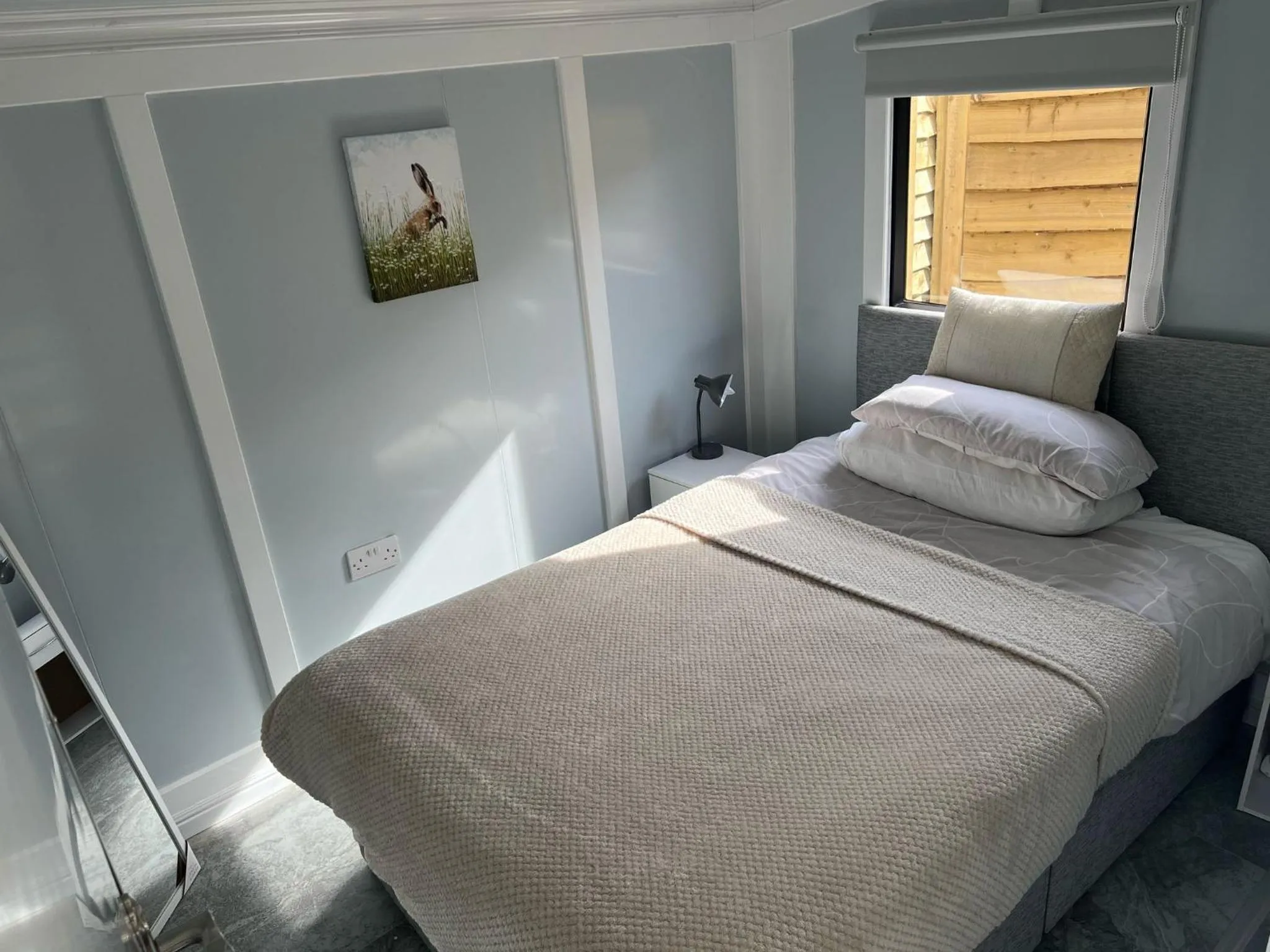Bed in Walsh's Mill Lodges & Linen House
