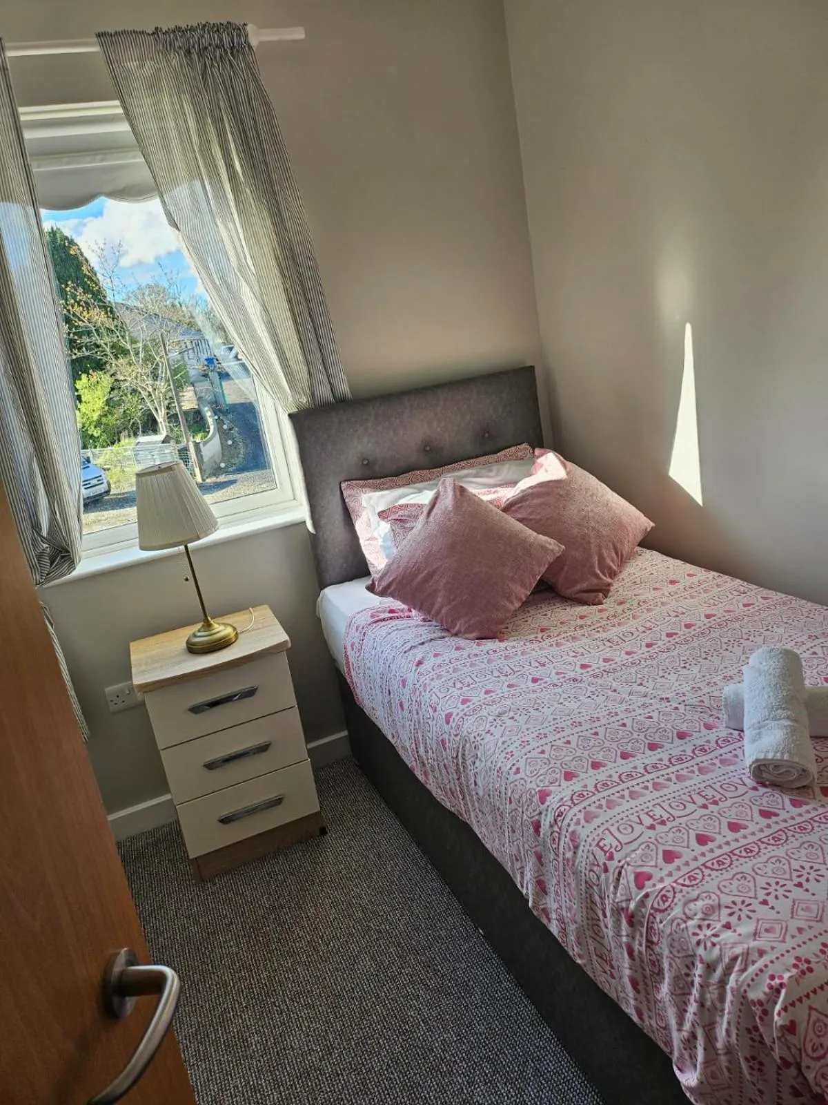 Bed in Walsh's Mill Lodges & Linen House