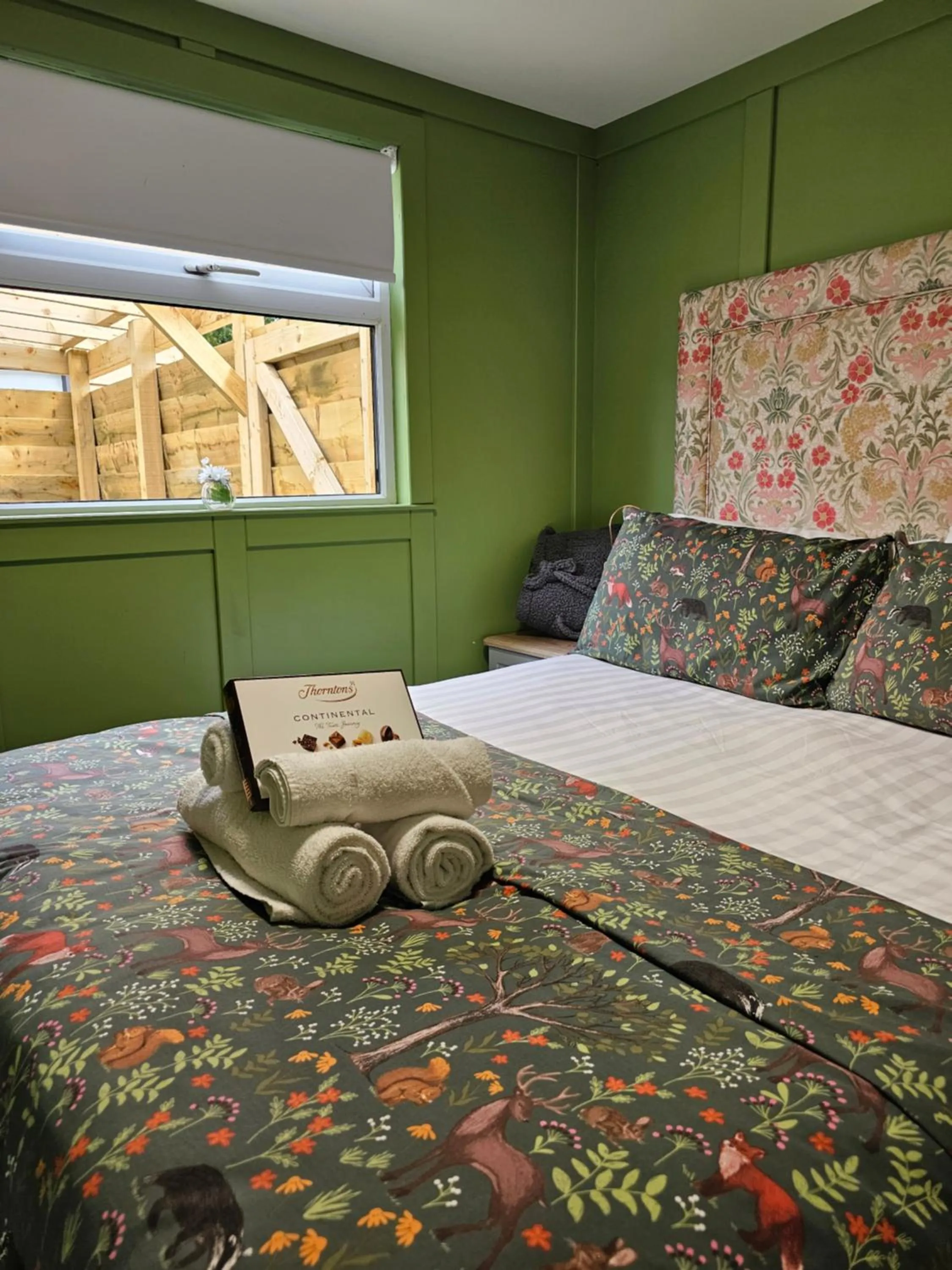 Bed in Walsh's Mill Lodges & Linen House