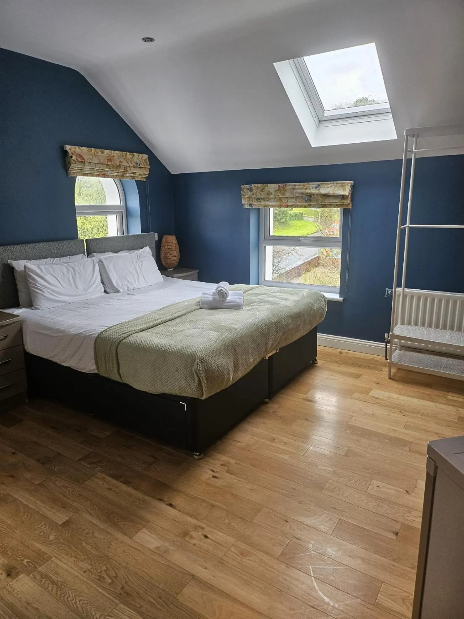 Bed in Walsh's Mill Lodges & Linen House