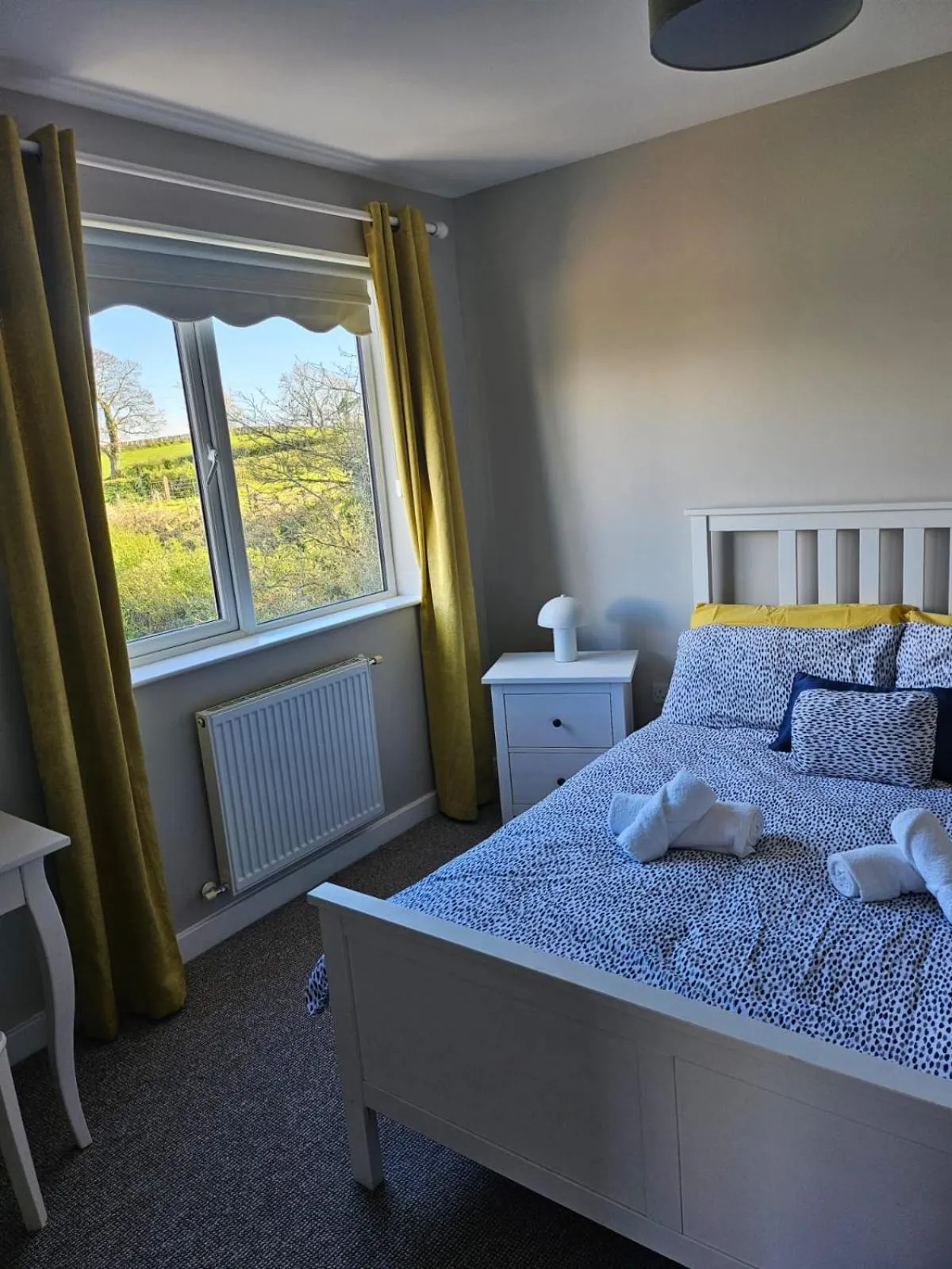 Bed in Walsh's Mill Lodges & Linen House