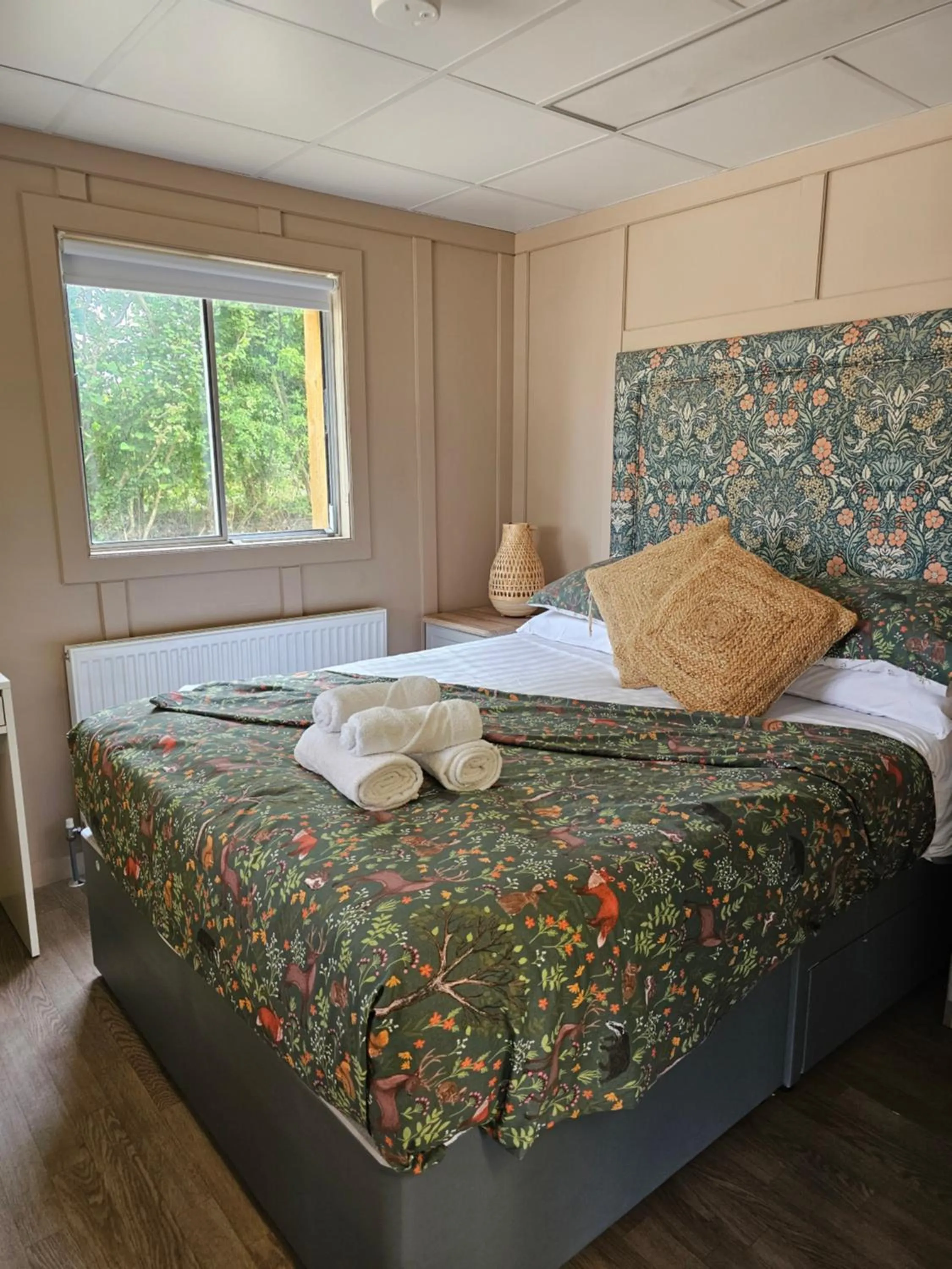 Bed in Walsh's Mill Lodges & Linen House