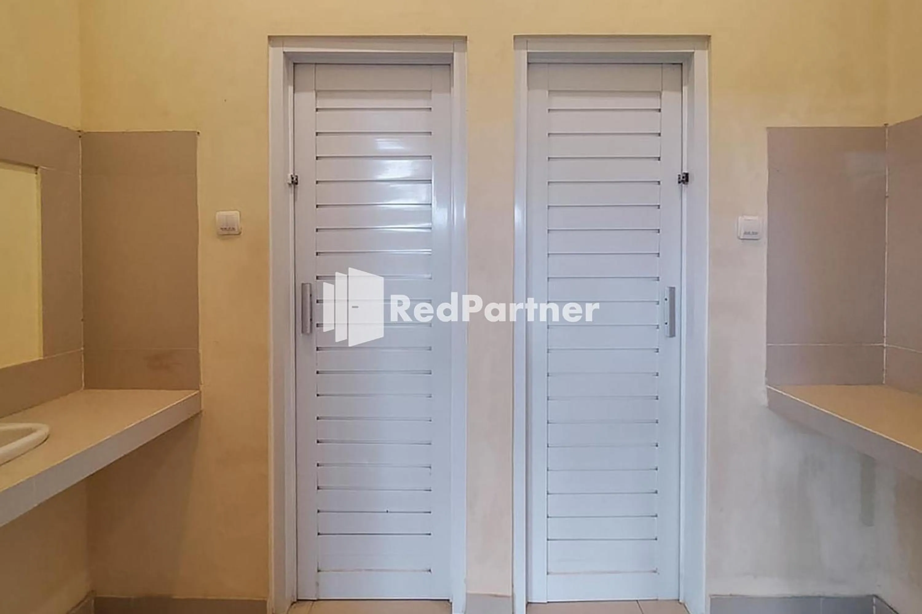 Bathroom in Batu Homestay Puncak Mitra RedDoorz