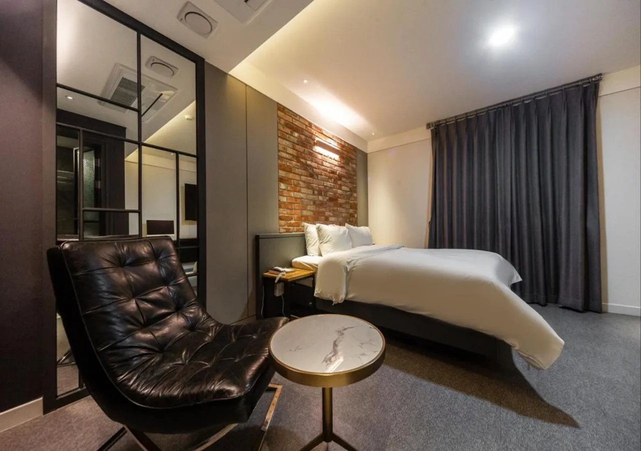 Photo of the whole room, Bed in West In Hotel Yeosu