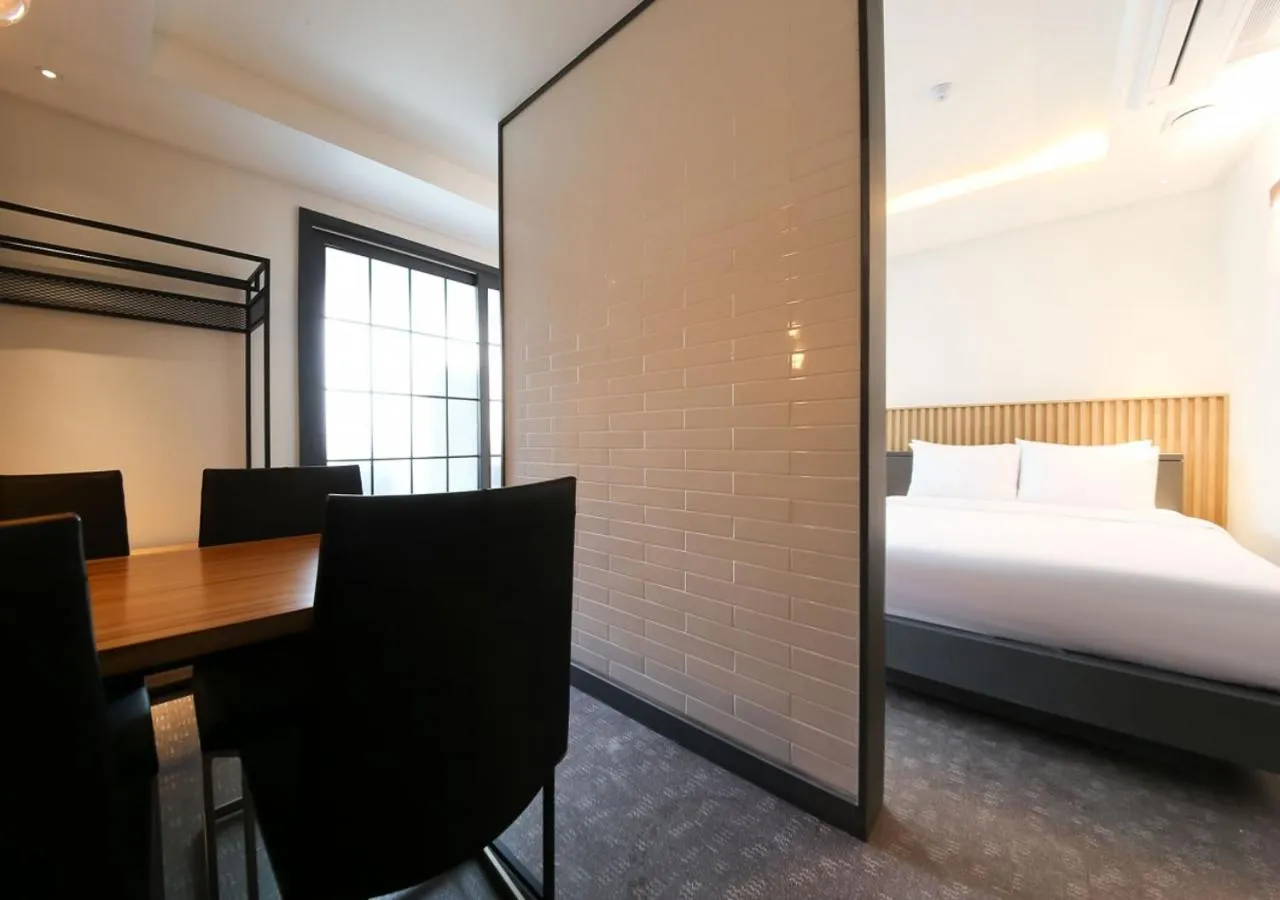 Dining area, Bed in West In Hotel Yeosu