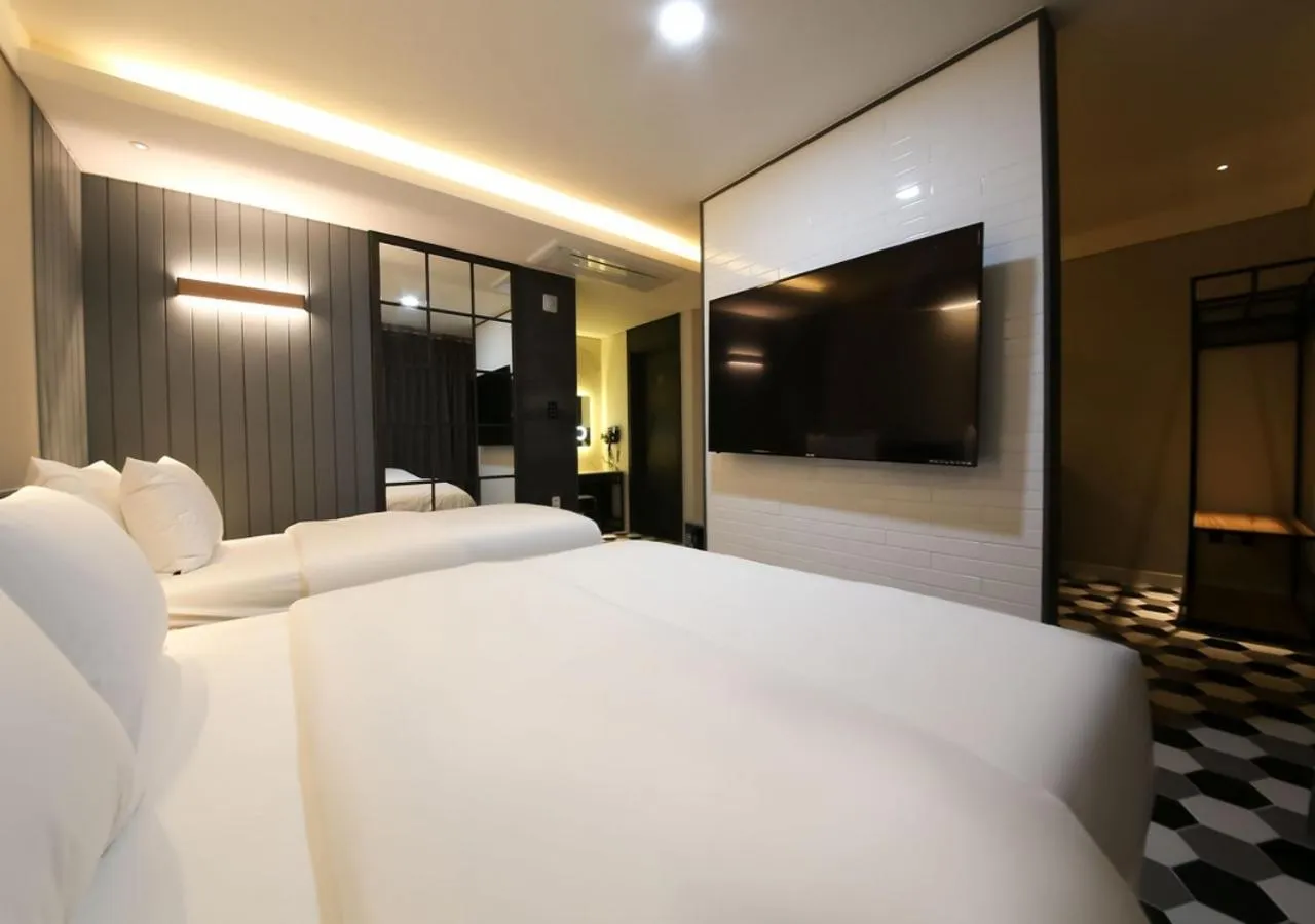 Bed in West In Hotel Yeosu