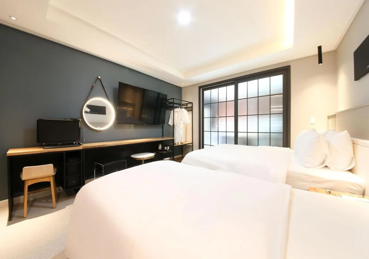 Photo of the whole room, Bed in West In Hotel Yeosu