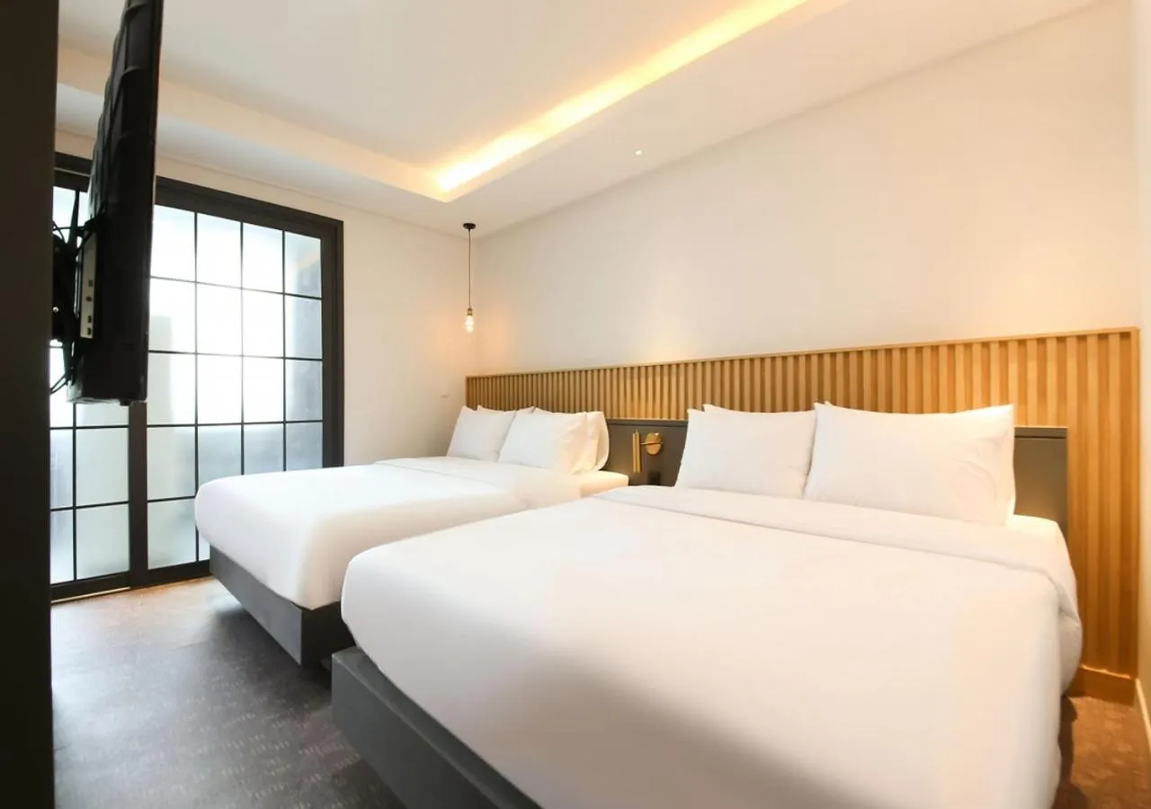 Bed in West In Hotel Yeosu