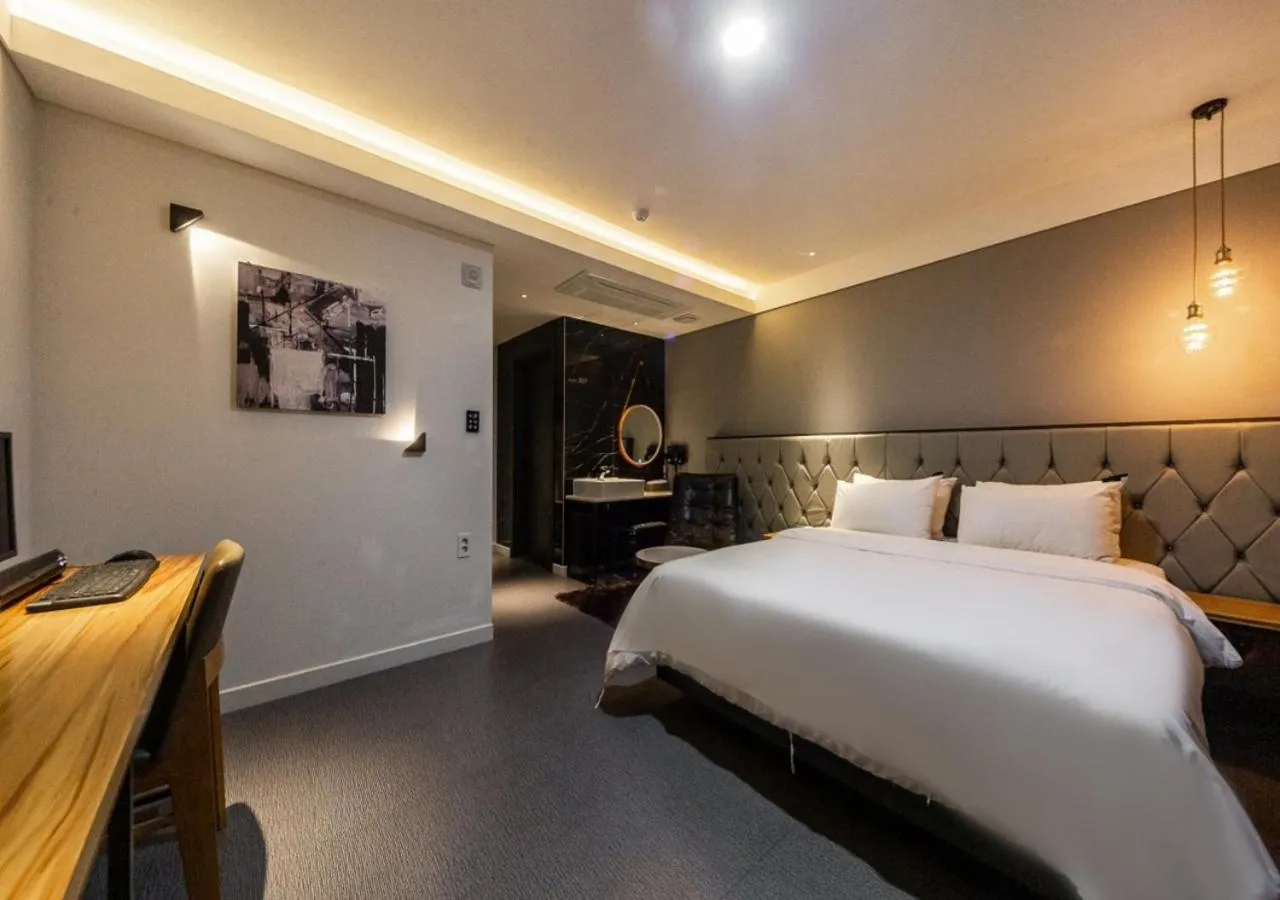 Photo of the whole room, Bed in West In Hotel Yeosu