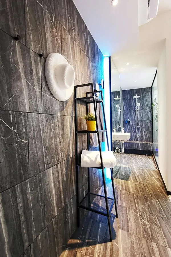 Bathroom, Bed in INNLUXPHUKET