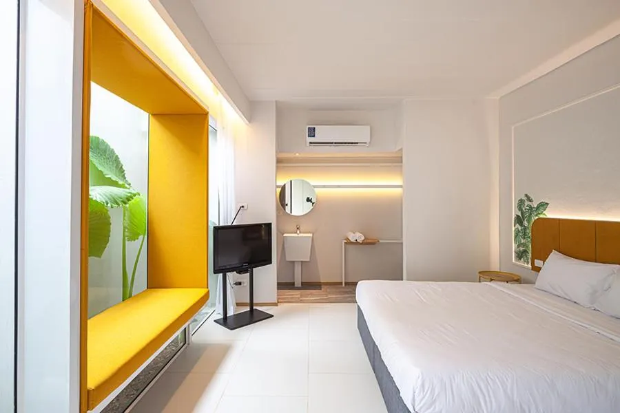 Photo of the whole room, Bed in INNLUXPHUKET