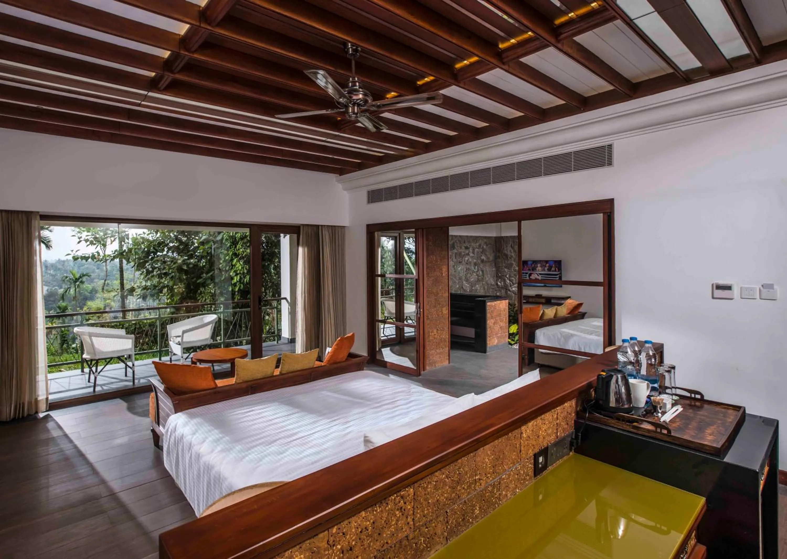 Living room, Bed in GReaT Trails Wayanad by GRT Hotels