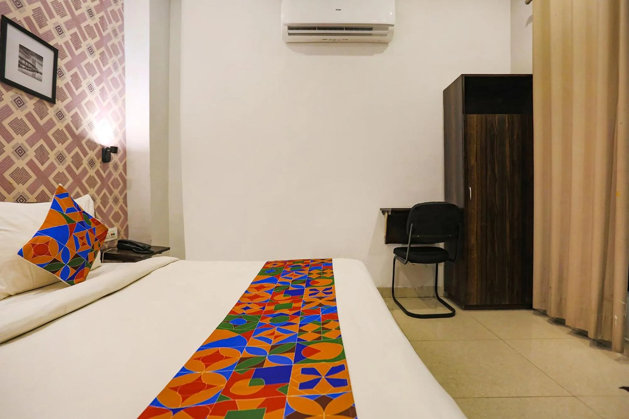 Photo of the whole room, Bed in FabExpress Novel Suites - Nr Yashobhoomi Convention Centre