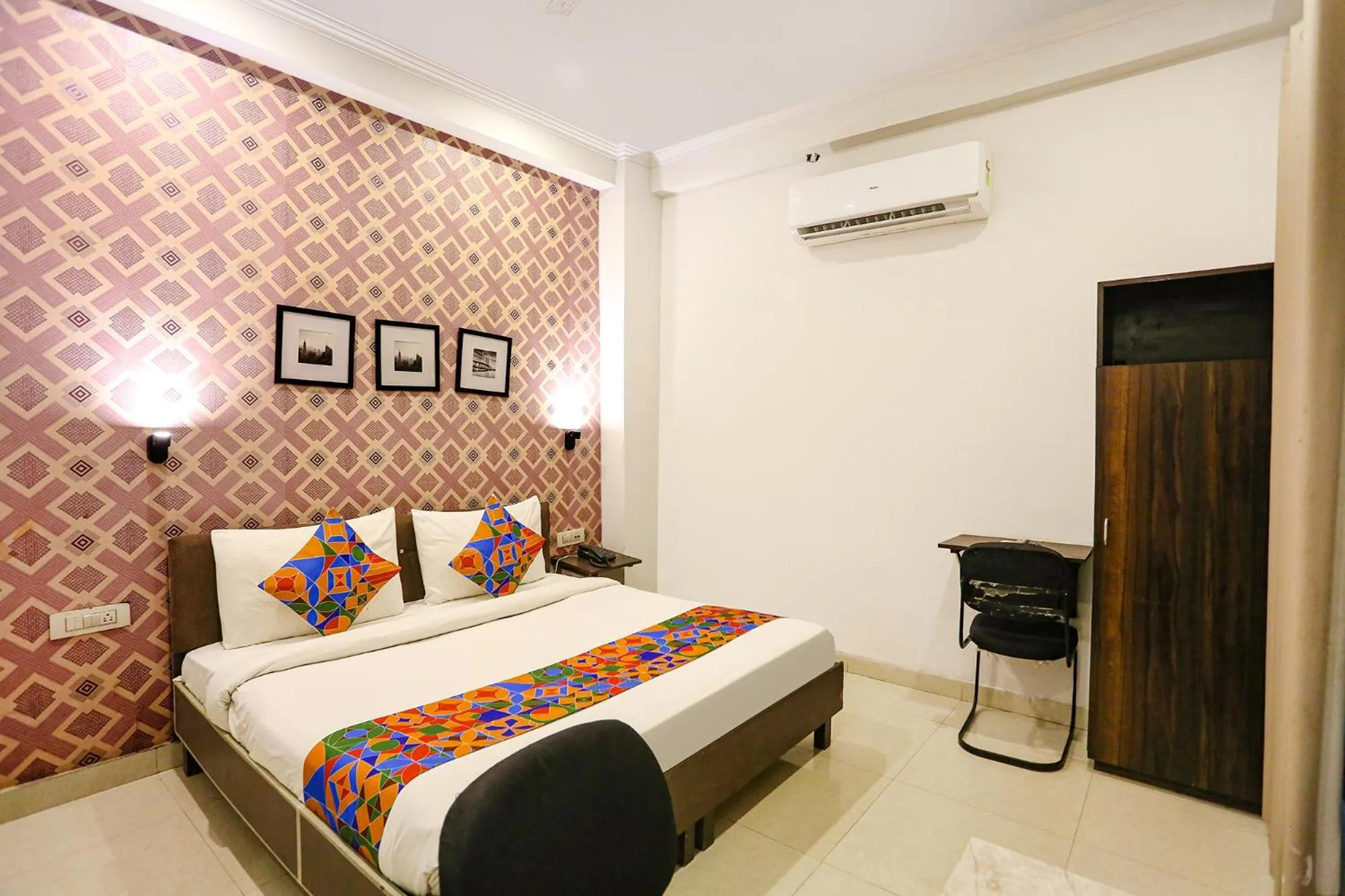 Photo of the whole room, Bed in FabExpress Novel Suites - Nr Yashobhoomi Convention Centre