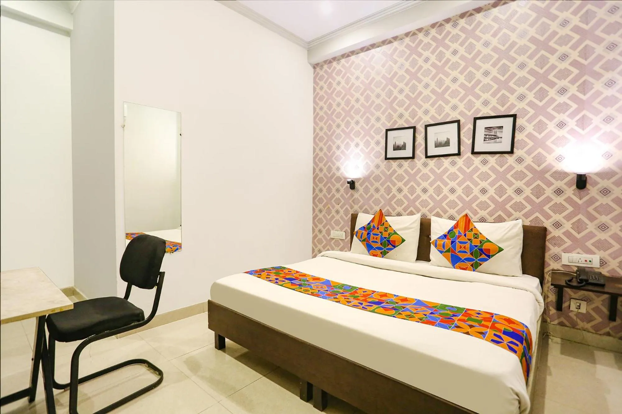 Photo of the whole room, Bed in FabExpress Novel Suites - Nr Yashobhoomi Convention Centre