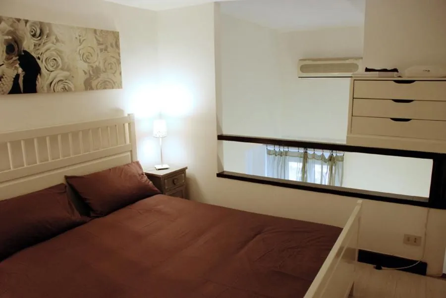 Bed in Palazzo Velli Suites