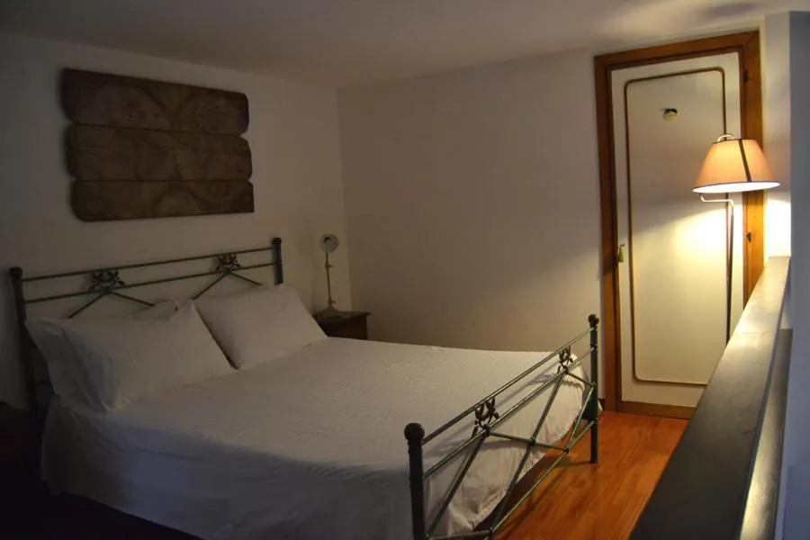 Bed in Palazzo Velli Suites