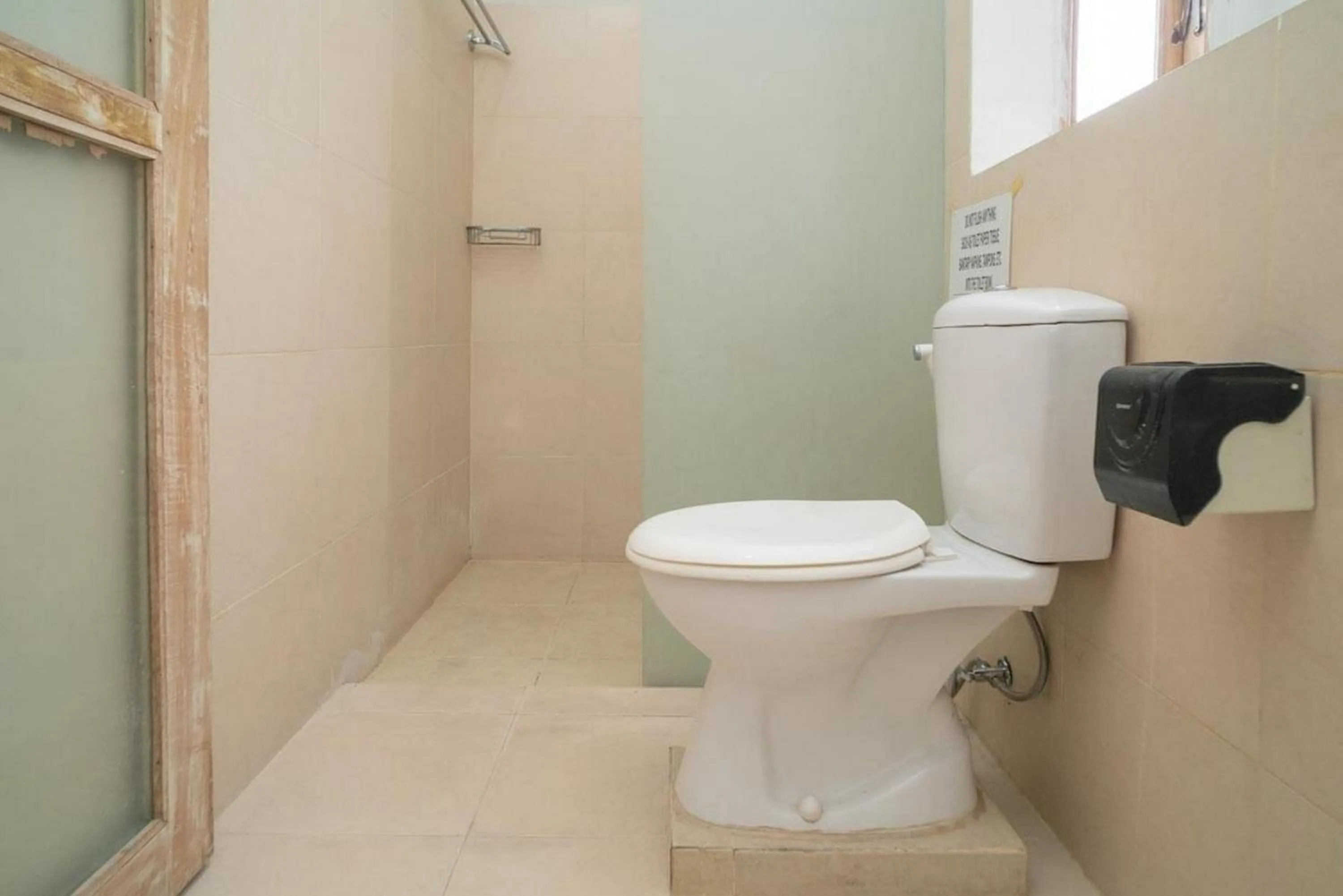 Bathroom in Urbanview Hotel Wayan Mansion