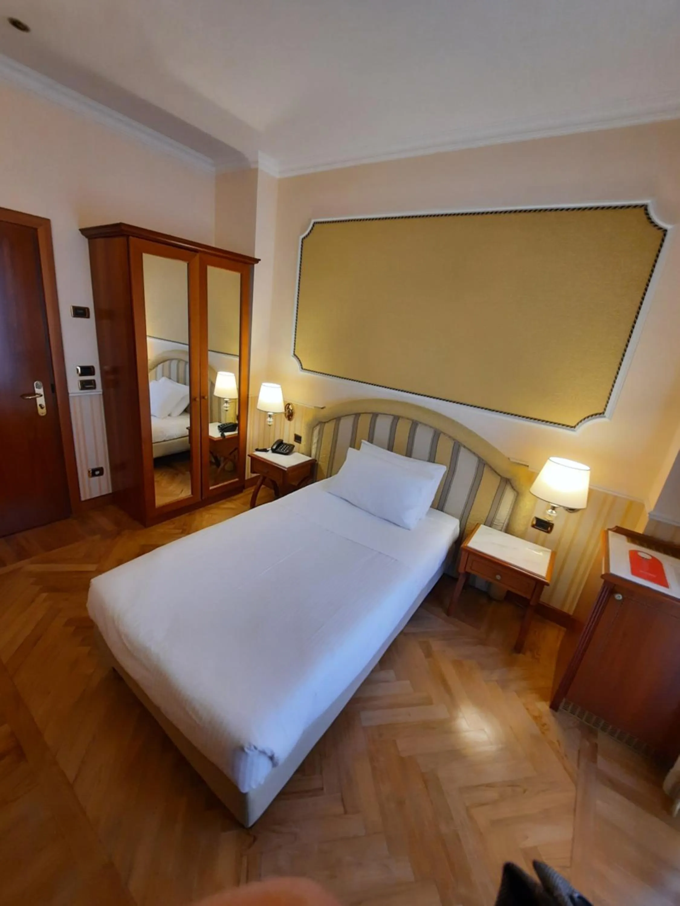 Bed in Andreola Central Hotel
