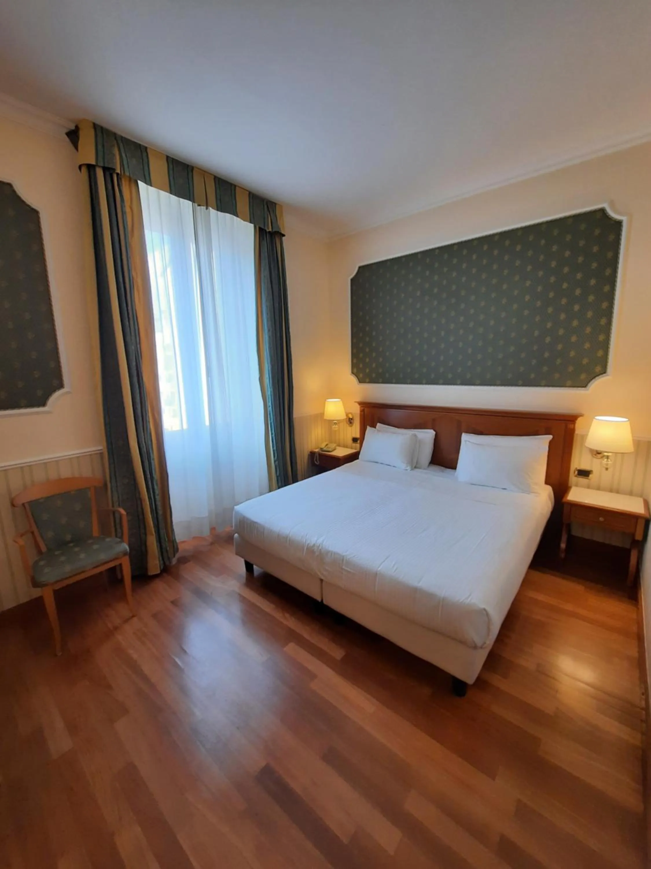 Bedroom, Bed in Andreola Central Hotel
