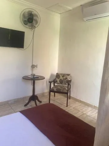 Bed in Pousada Casa de mãe aconchegante com piscina próximo à praia